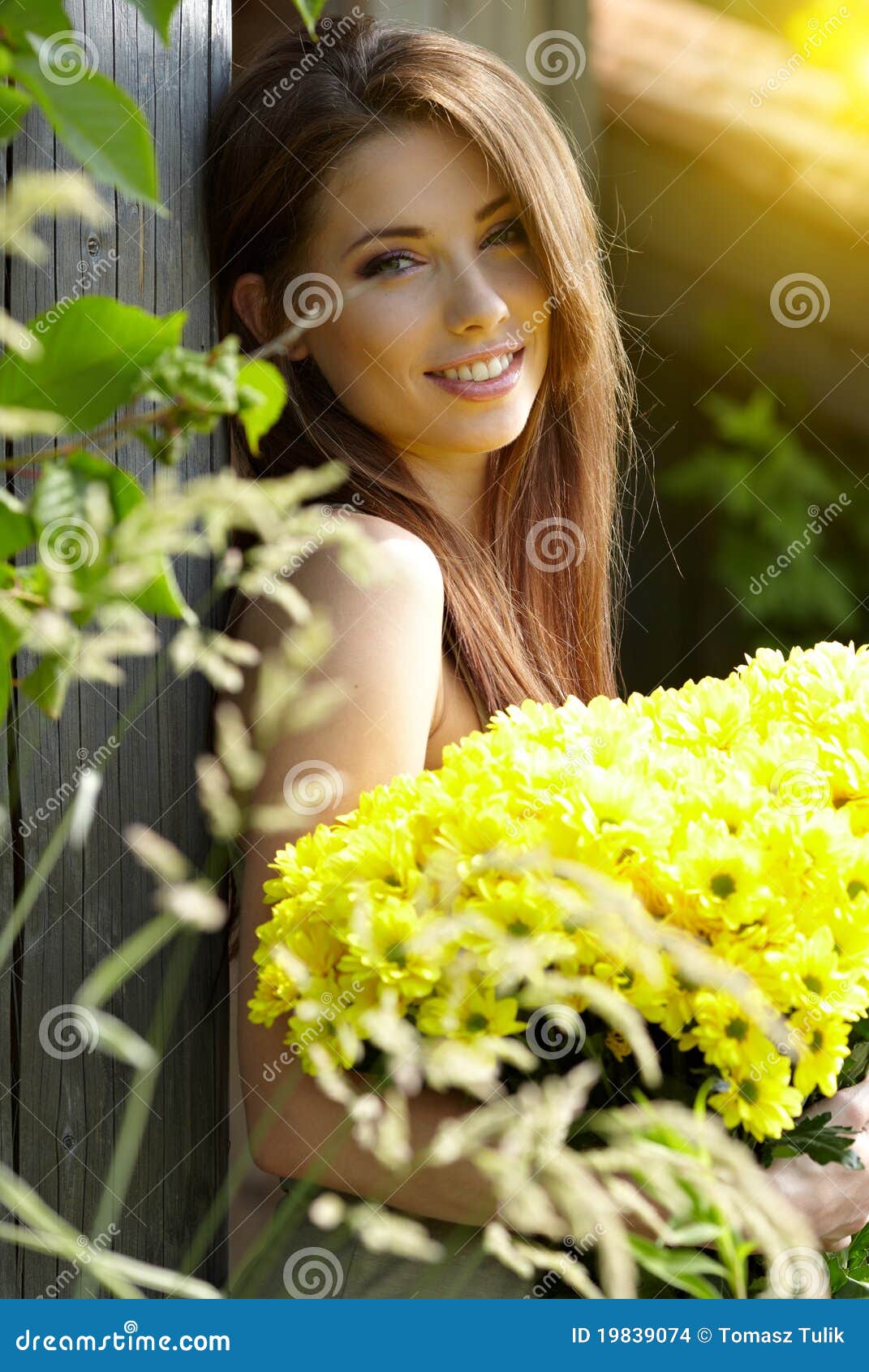 Young Girl with Yellow Flowers Stock Photo Image of attractive