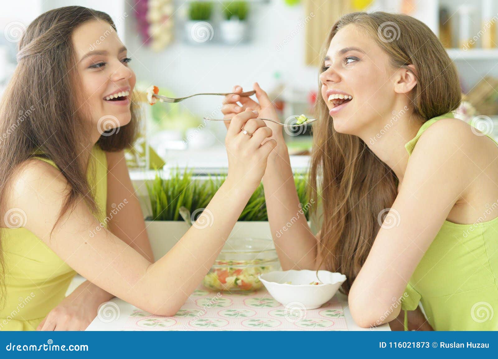 Young girls in the kitchen stock image. Image of european - 116021873