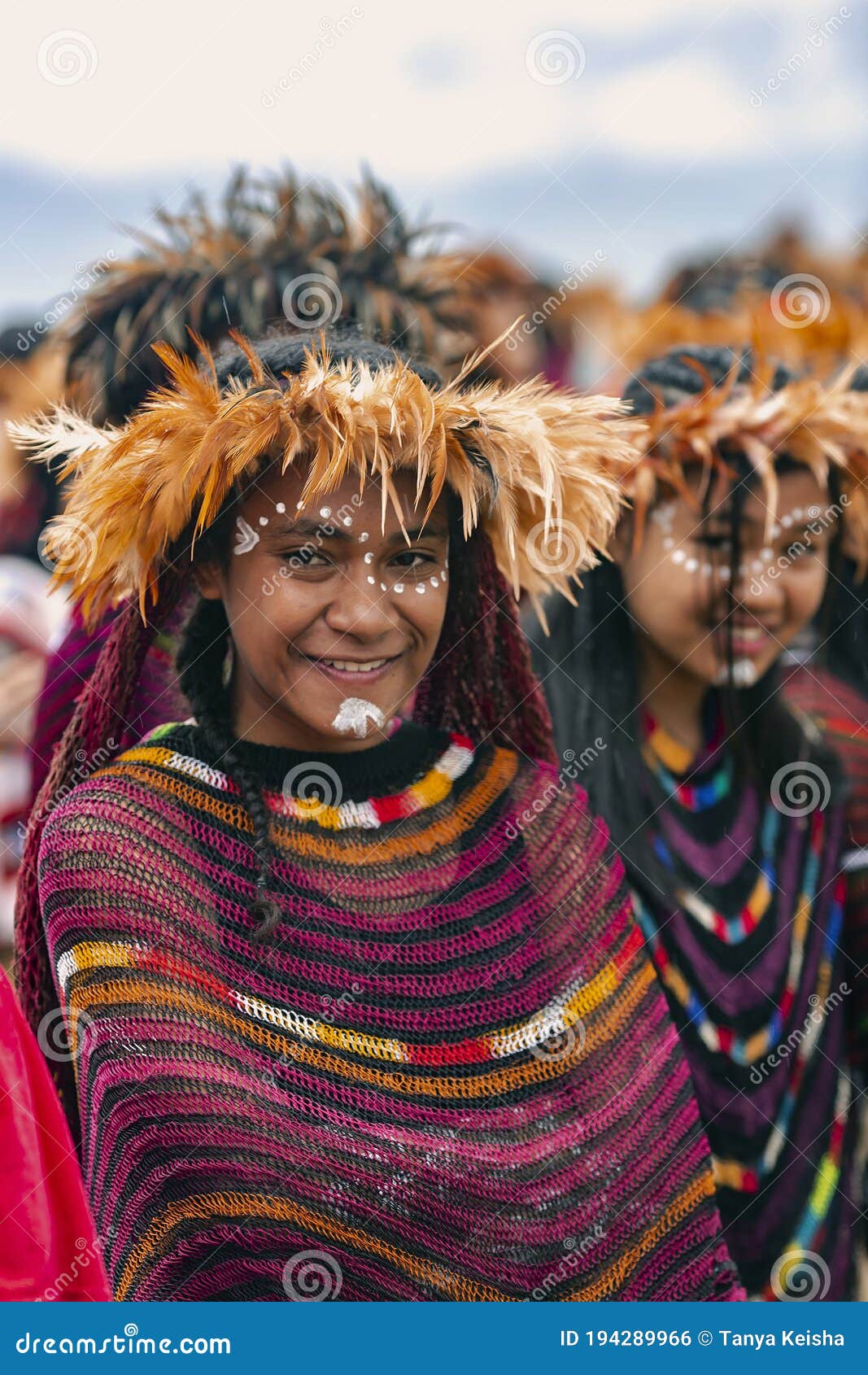 Young Girls  Of A Papuan Tribe In A Beautiful Crown From 