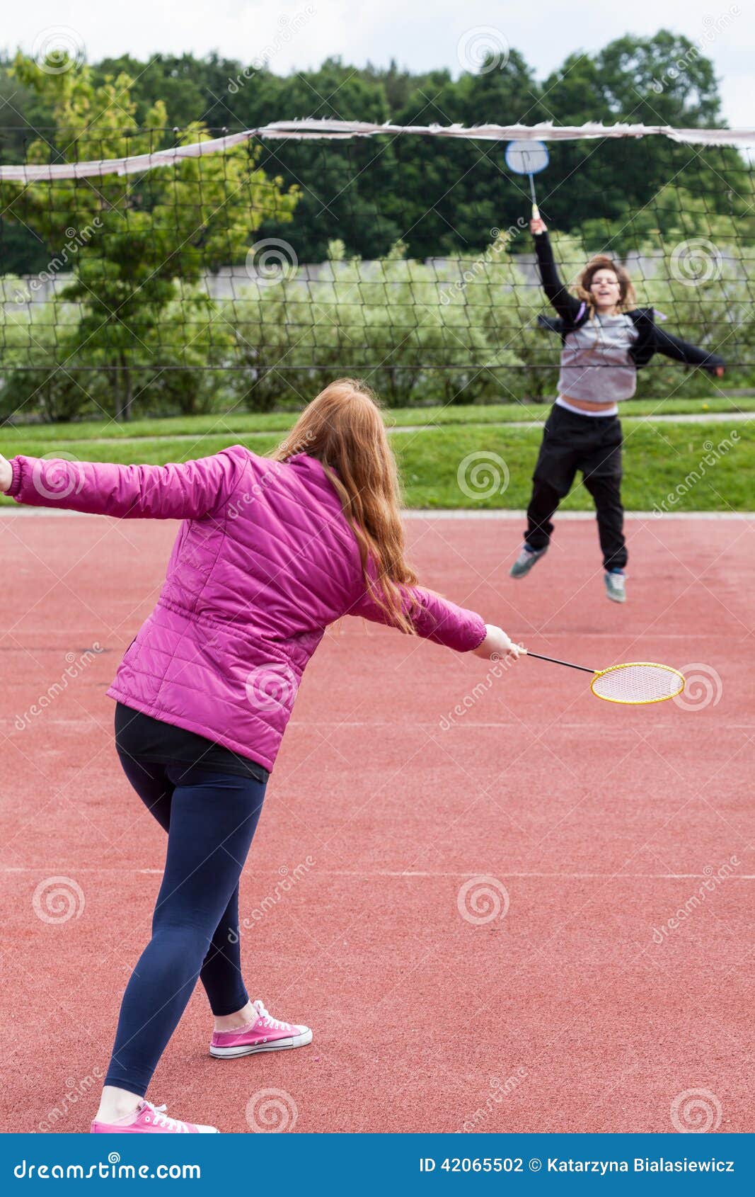 Young Girls Playing Badminton Stock Photo Image of park, outside