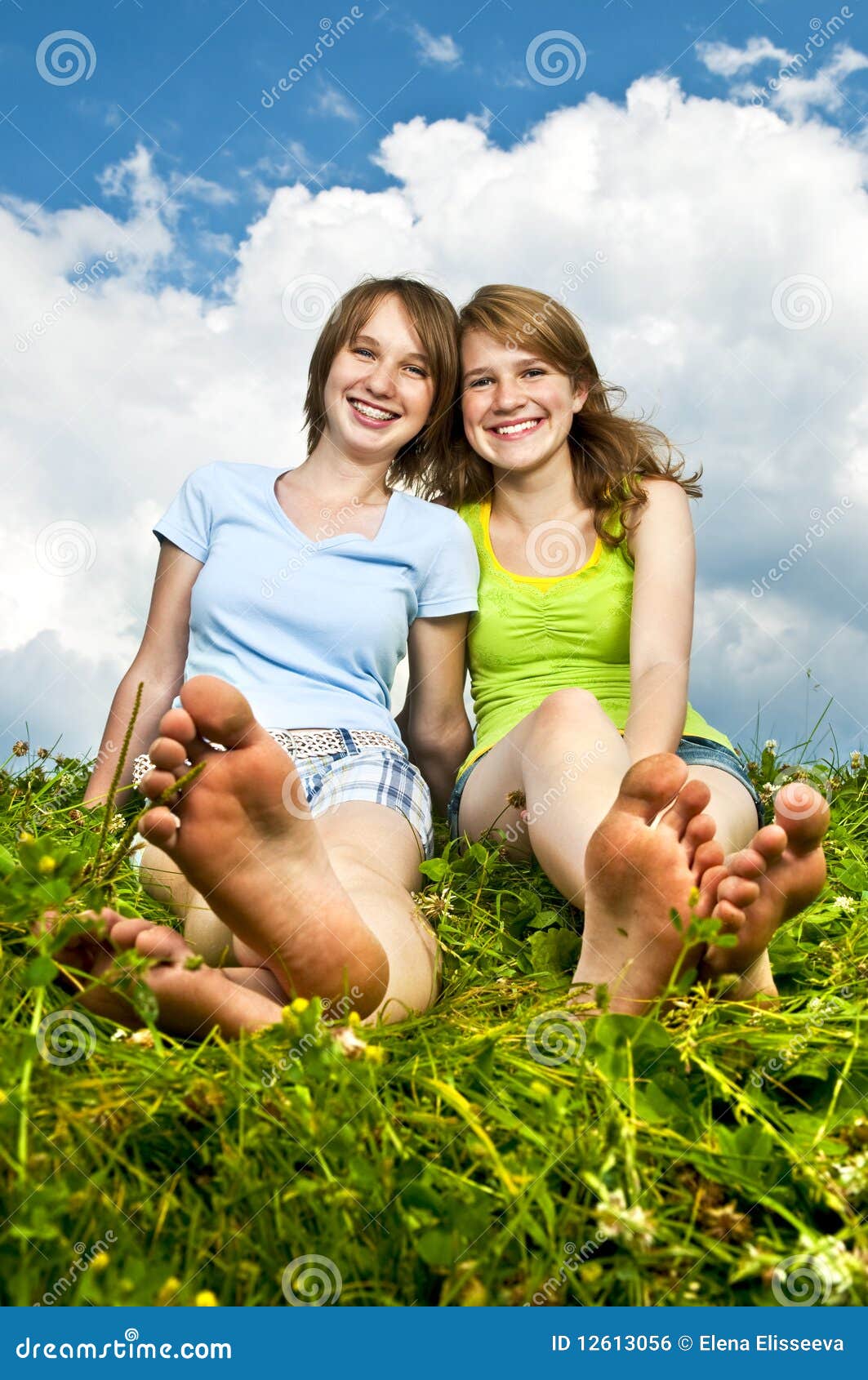 https://thumbs.dreamstime.com/z/young-girls-sitting-meadow-12613056.jpg