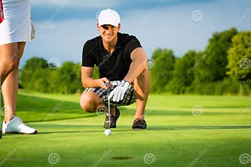 Young Golf Player On Course Putting And Aiming Stock Photo Image Of Hole Legs 26007238