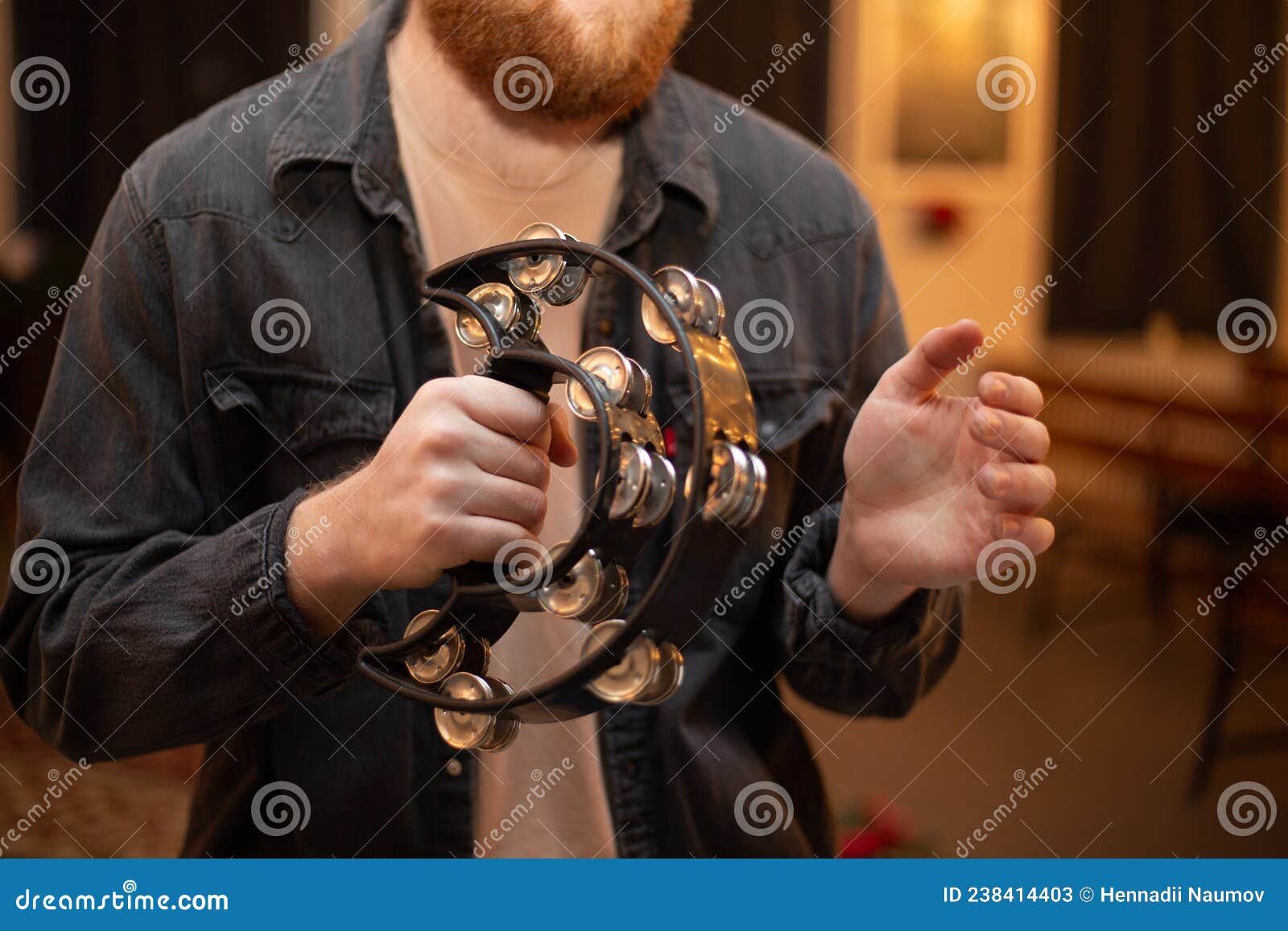 A Young Guy with a Beard Plays the Tambourine Stock Image Image of