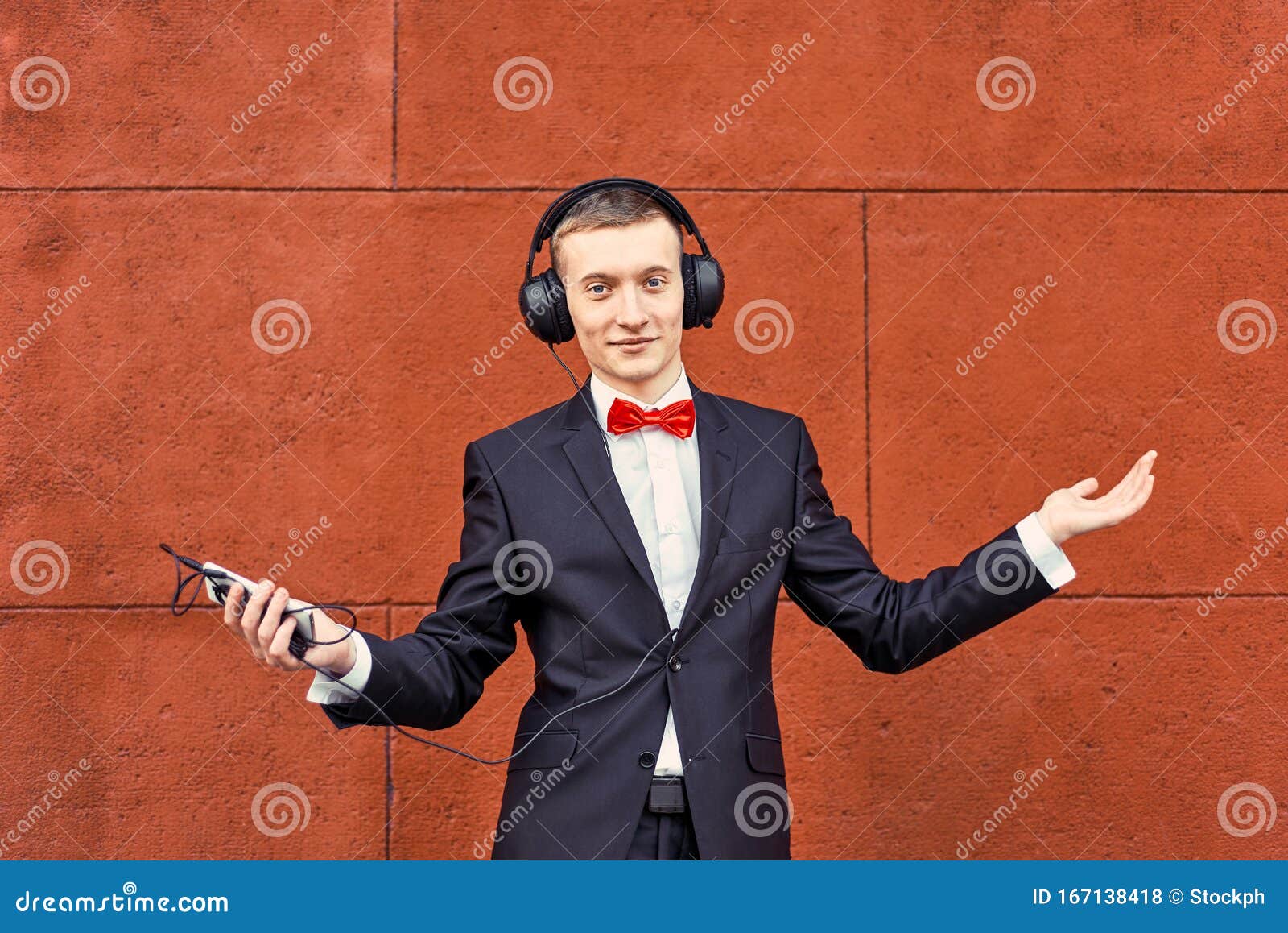 images Black Suit Black Shirt Red Bow Tie https www dreamstime com young guy black suit white shirt red bow tie man big headphones listening to music background burgundy wall image167138418