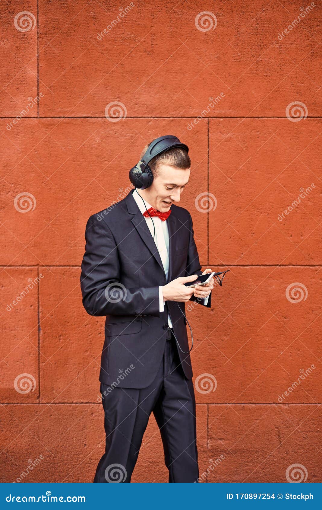 pic Black Suit Black Shirt Red Bow Tie https www dreamstime com young guy black suit white shirt red bow tie man big headphones listening to music background burgundy wall image170897254