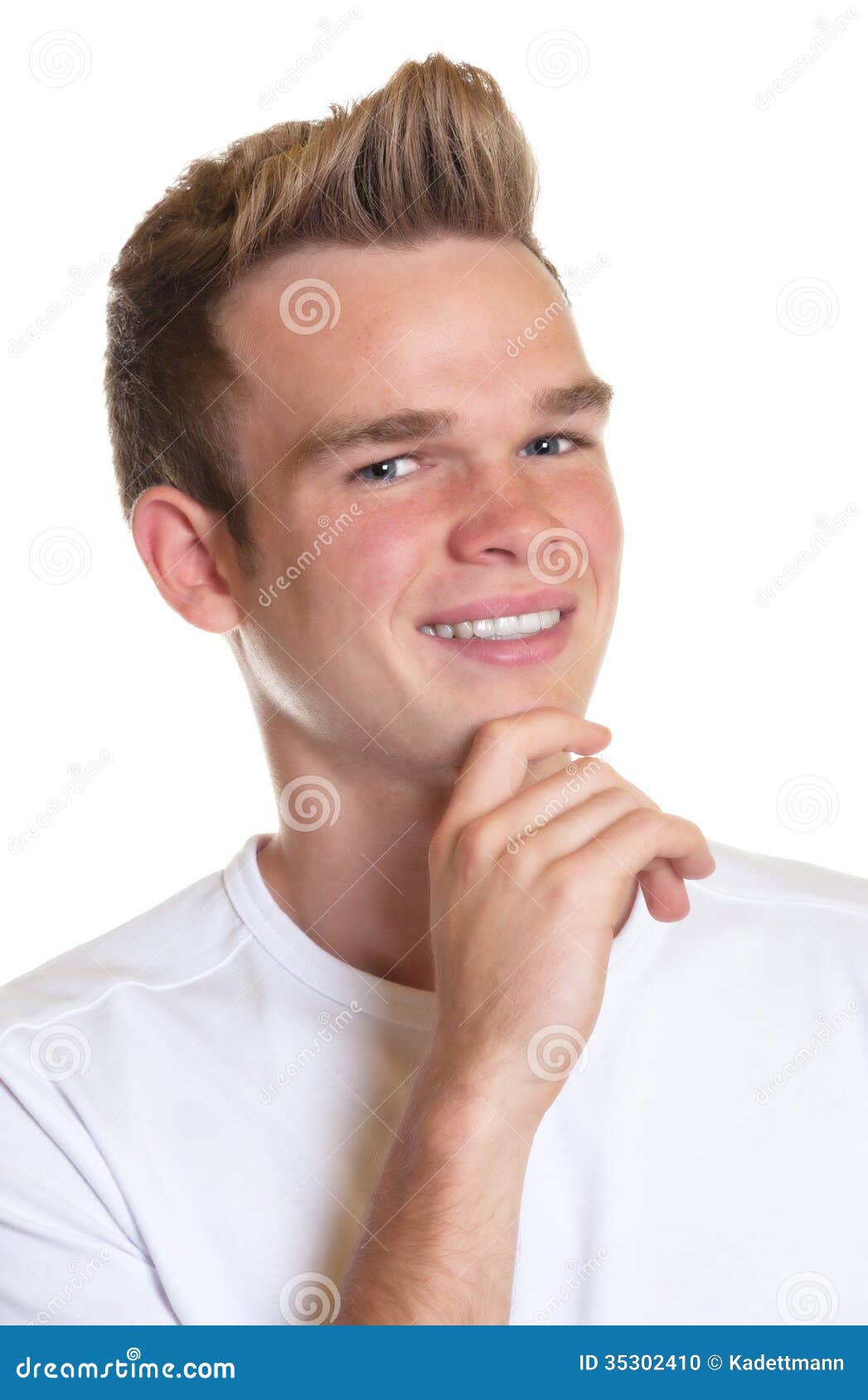 Young Guy With Blond Hair Laughing At Camera Stock Photo 