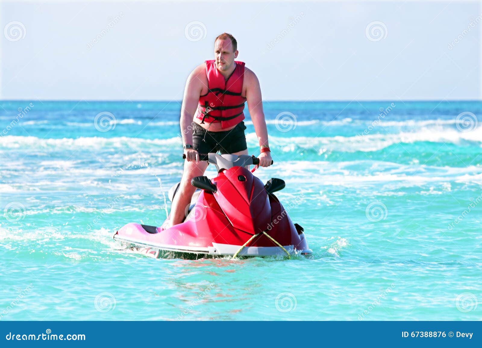 Young Guy Cruising on a Jet Ski Stock Photo Image of white, adventure