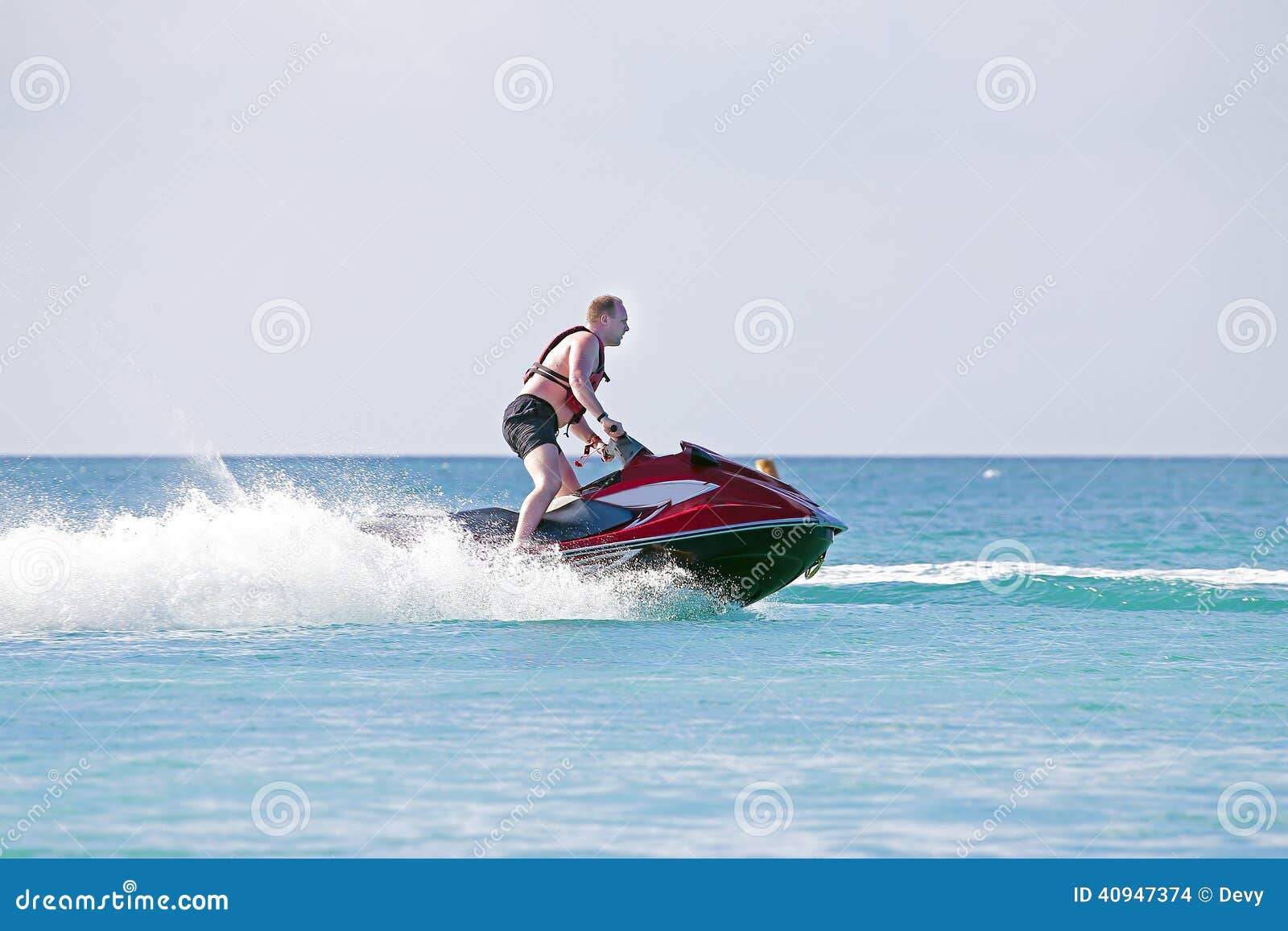 Young Guy Cruising on a Jet Ski Stock Photo Image of horizon, people