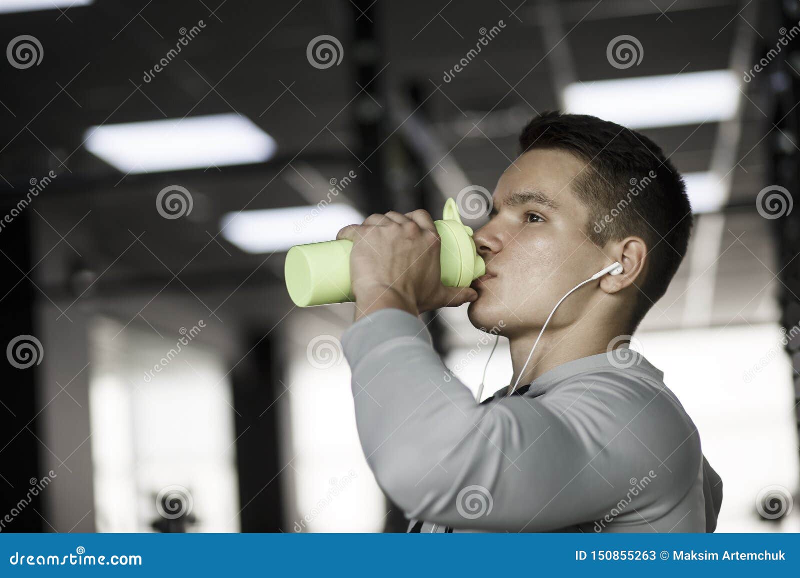 Young Guy Drinks from a Shaker in Gym Stock Image Image of fitness