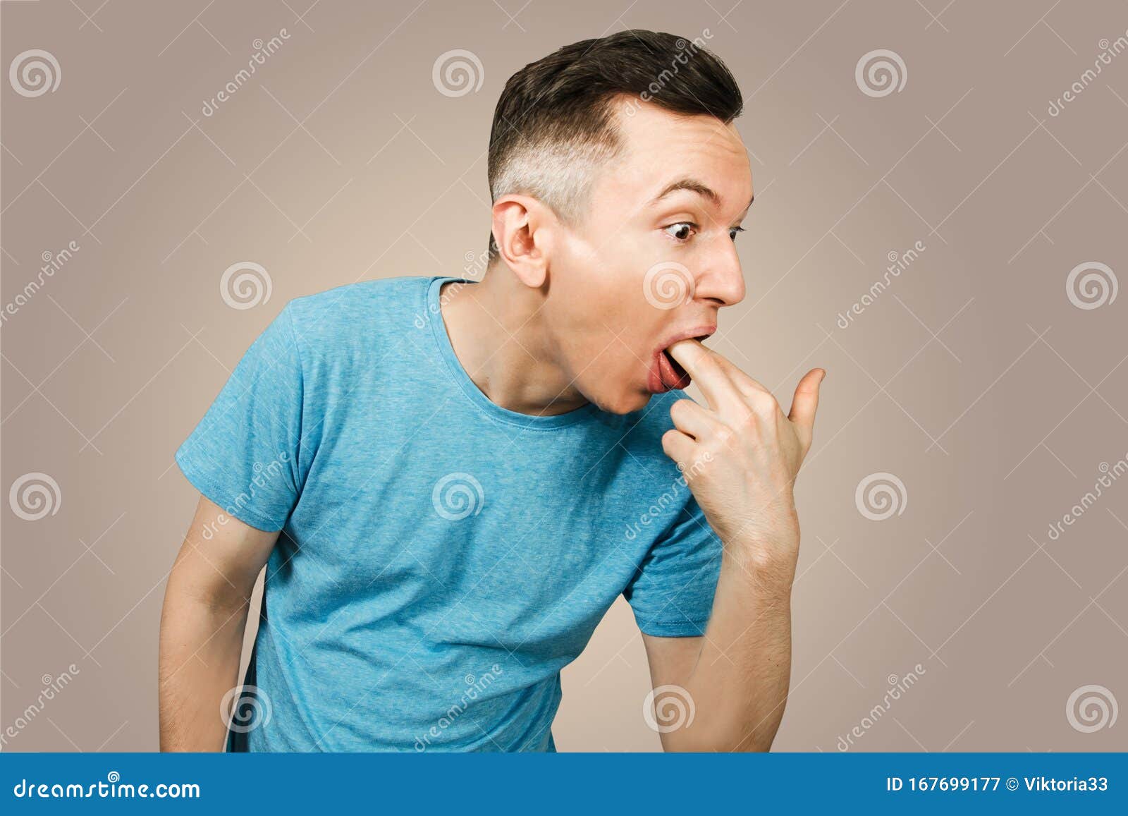 Young Guy Inserts Two Fingers In The Mouth To Induce Vomiting, On A