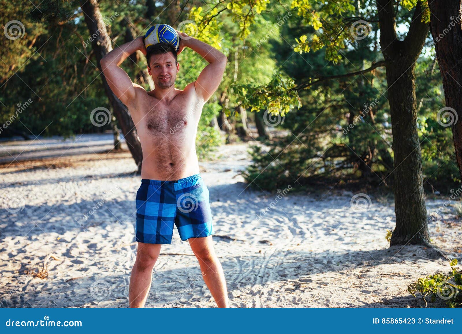 Young Guy Playing Volleyball on the Beach Stock Image Image of