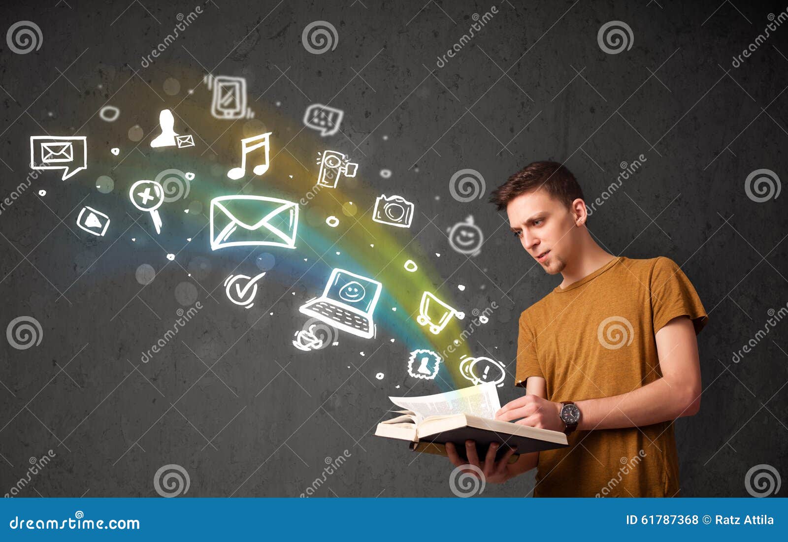 Young Guy Reading a Book with Multimedia Icons Coming Out of the Stock