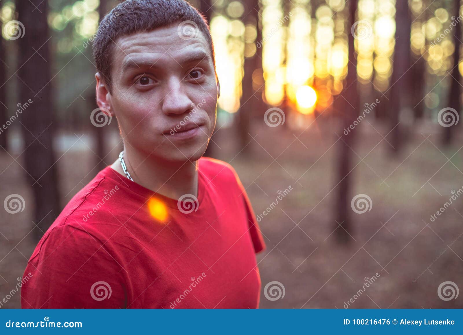 A Young Guy in a Red T-shirt in a Pine Forest Stock Photo - Image of ...