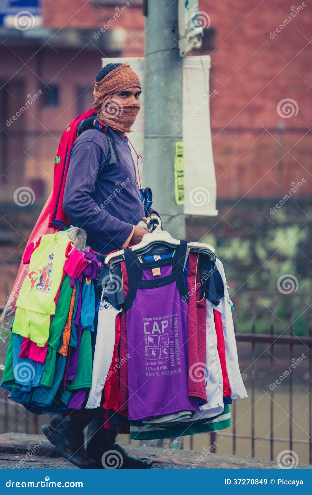 Man selling clothes street market hi-res stock photography and images -  Alamy