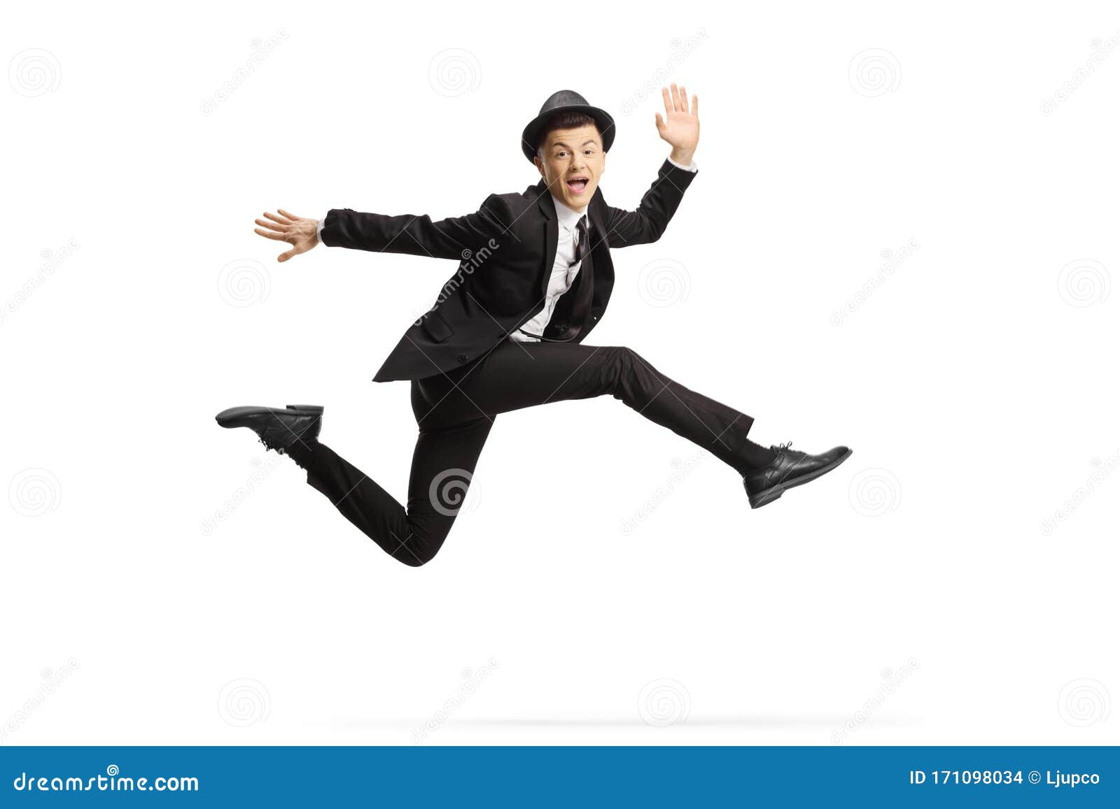 Young Guy in a Suit and Top Hat Jumping High Stock Photo - Image of ...