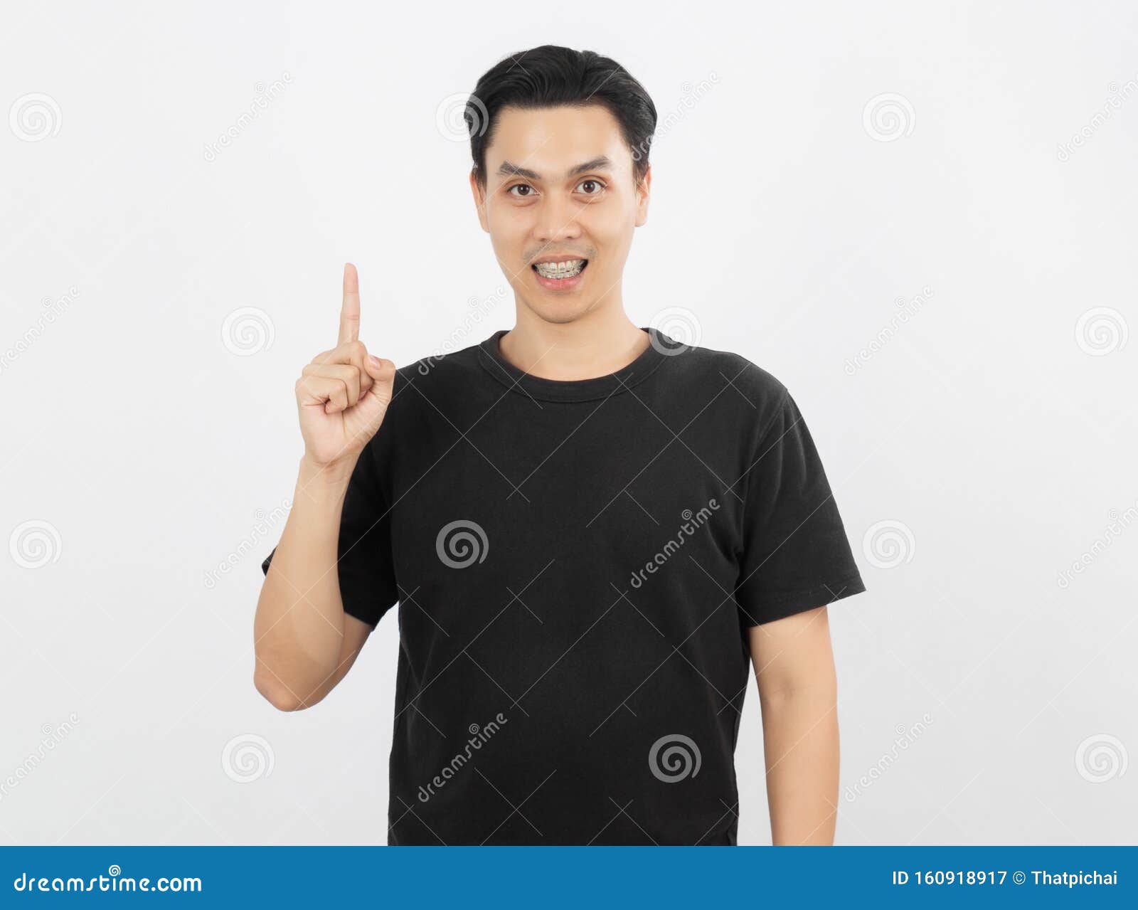 Young Handsome Asian Man Smiling With Braces And Looking At Camera With ...