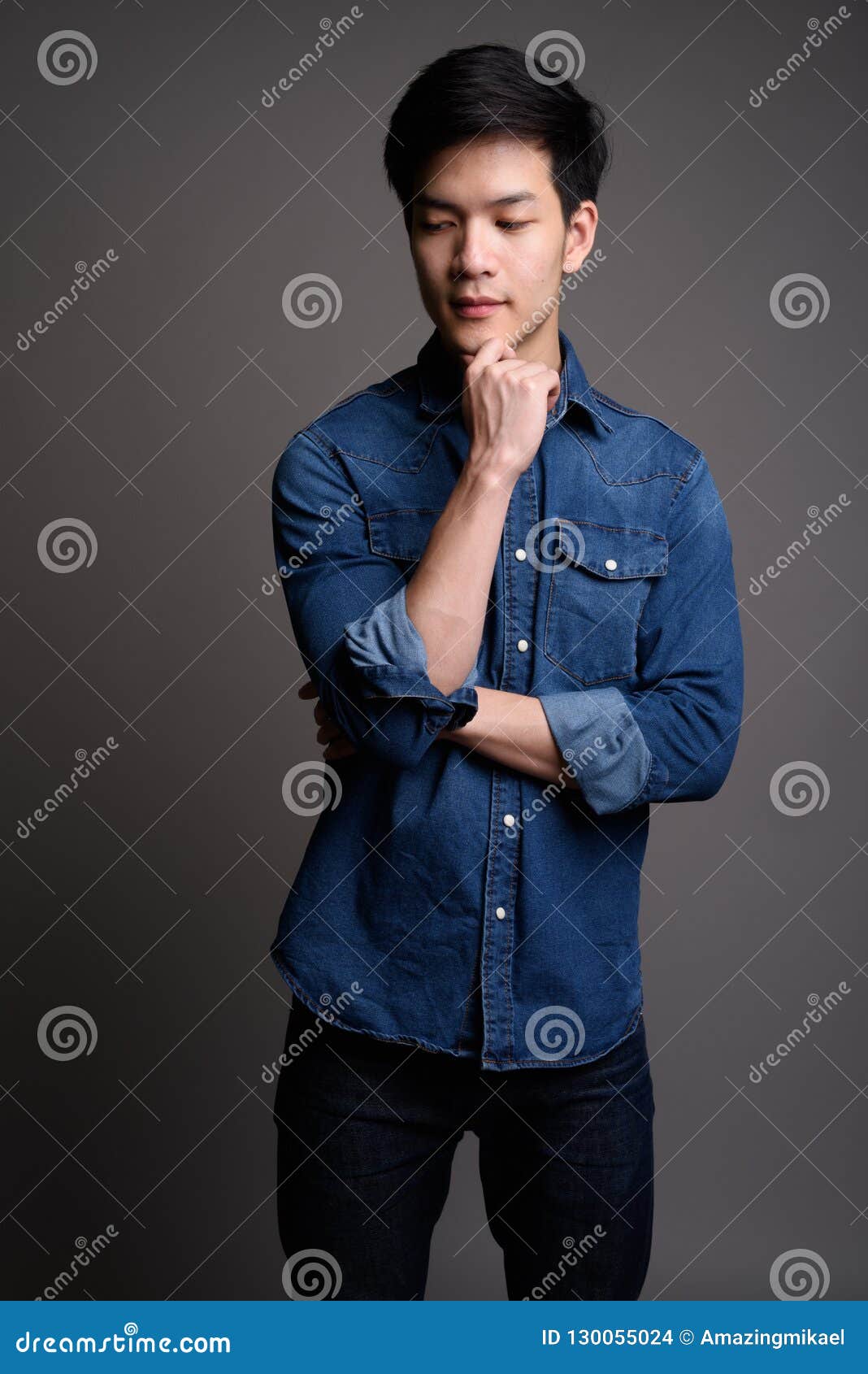 Young Handsome Asian Man Wearing Denim Shirt Stock Photo - Image of ...