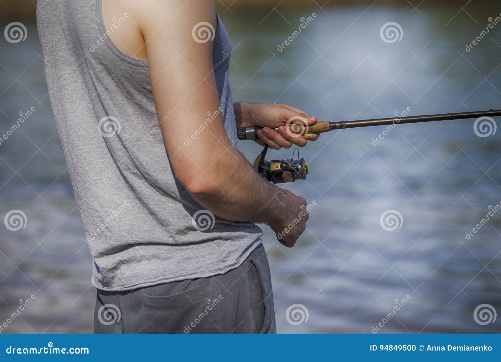 Young Handsome Brutal Caucasian Man in Casual Outfit Fishing on Stock Photo  - Image of river, bait: 94849500