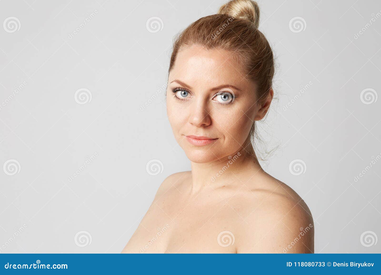 Young Handsome Girl With Blonde Hair Fixed Behind Big Eyes Thick