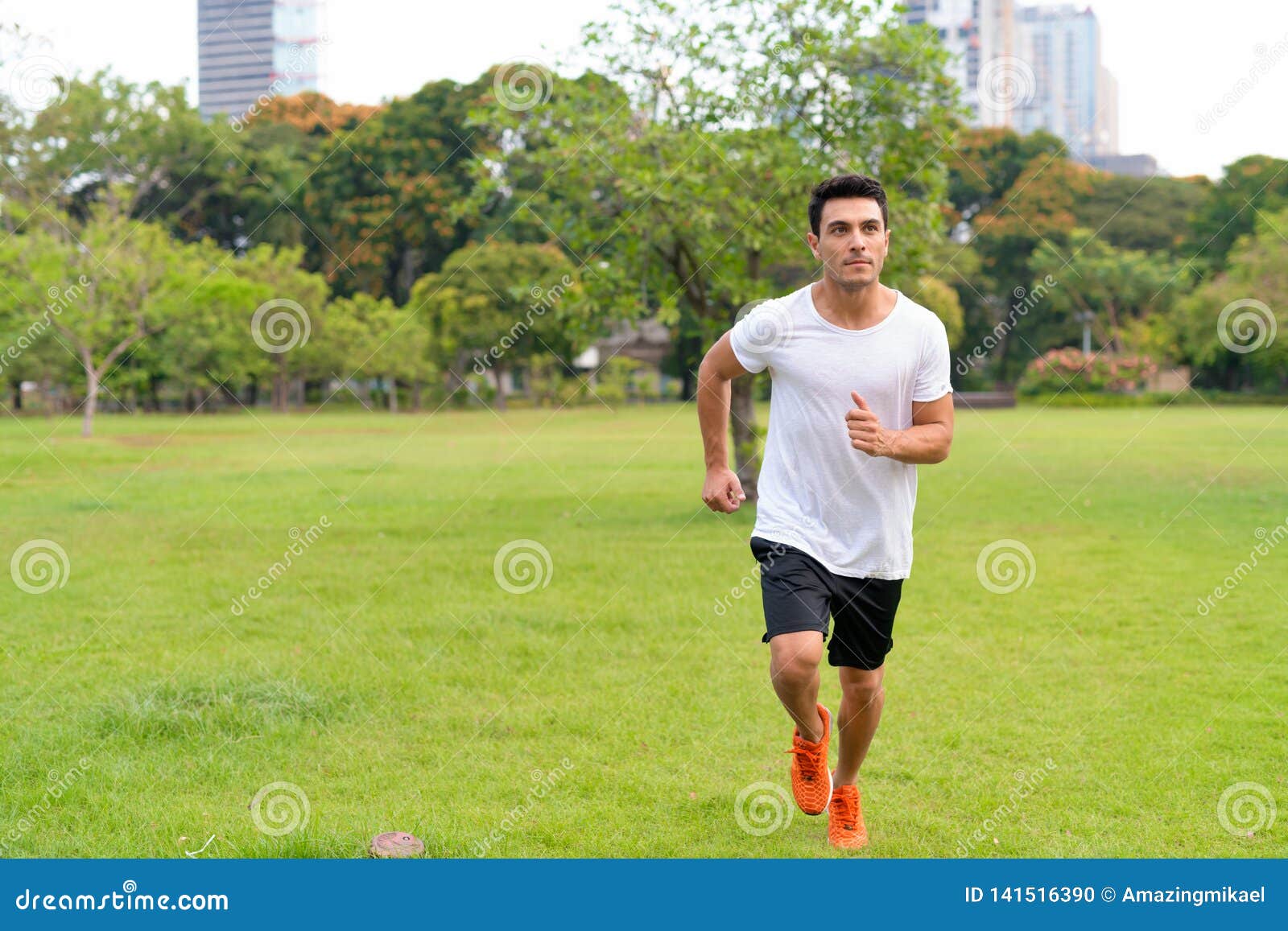 Young Handsome Hispanic Man Jogging at the Park Outdoors Stock Photo ...