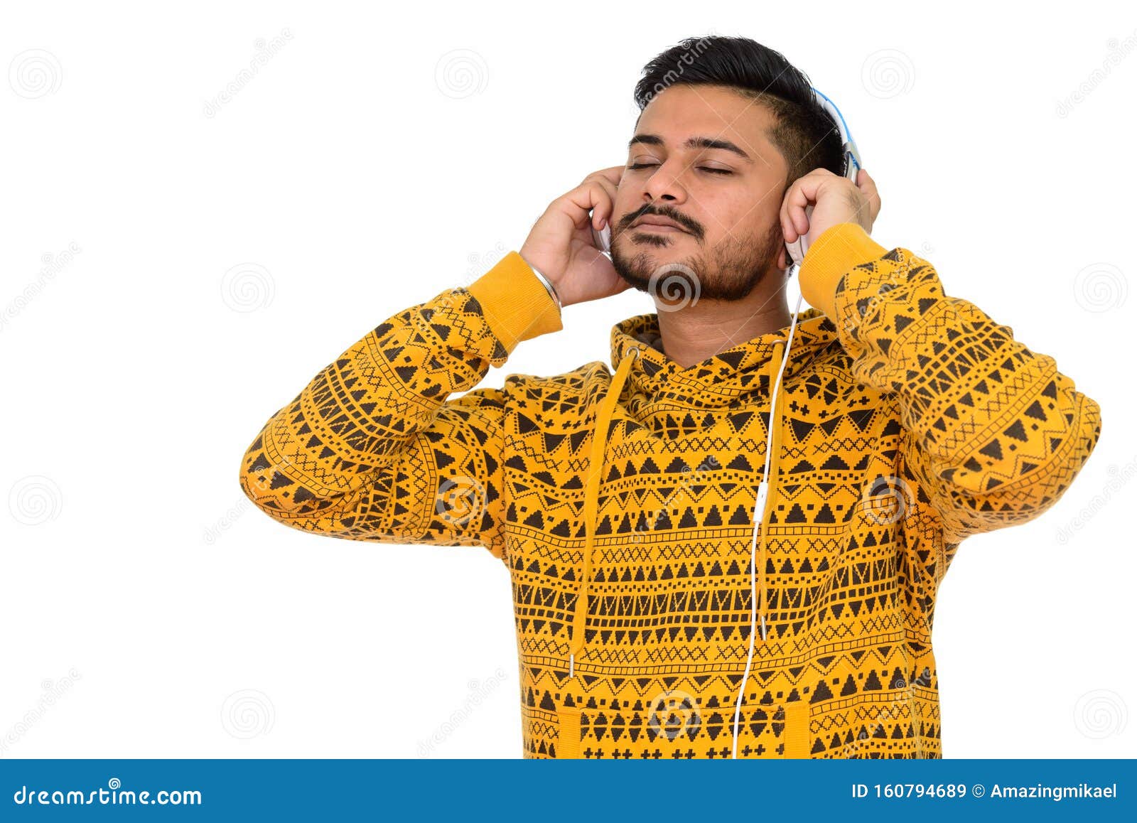 Young Handsome Indian Man Listening To Music Stock Image I