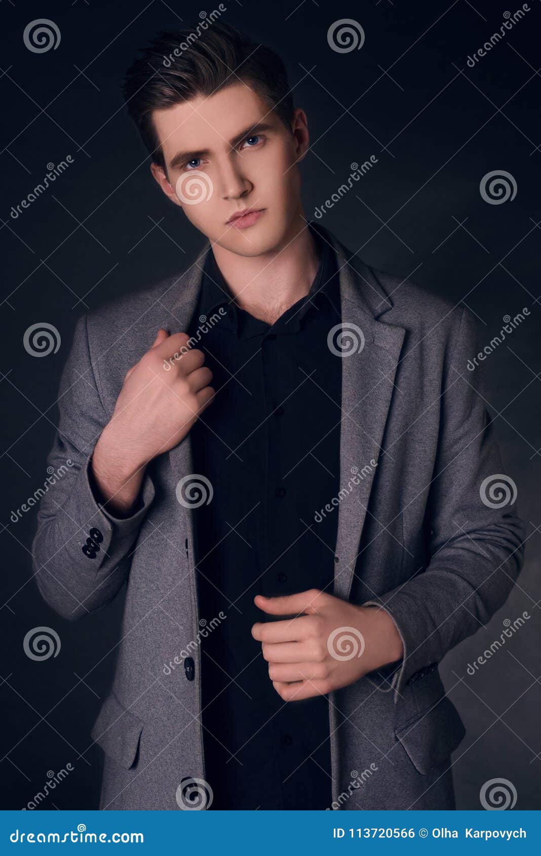 Young Handsome Man in Coat. Portrait of Fashionable Well Dressed Man Posing  in Grey Stylish Coat Stock Photo - Image of isolated, fashionable: 113720630