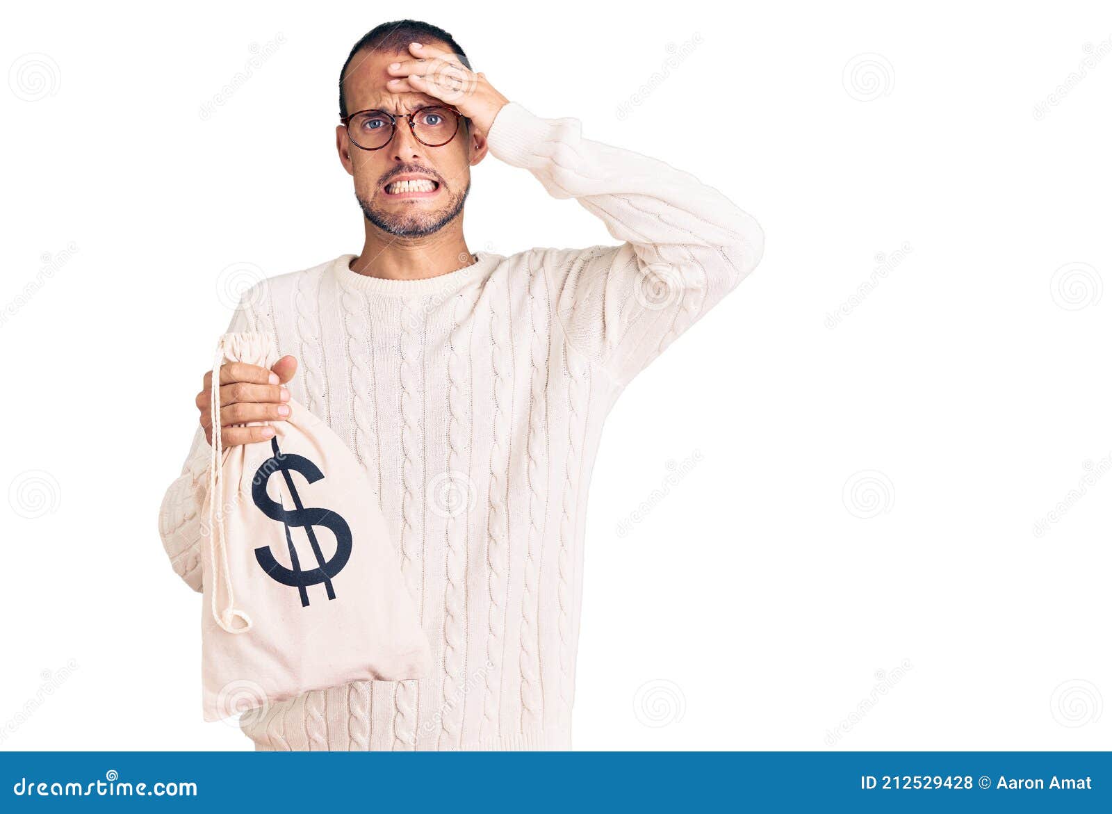 Young Handsome Man Holding Money Bag with Dollar Symbol Stressed and ...