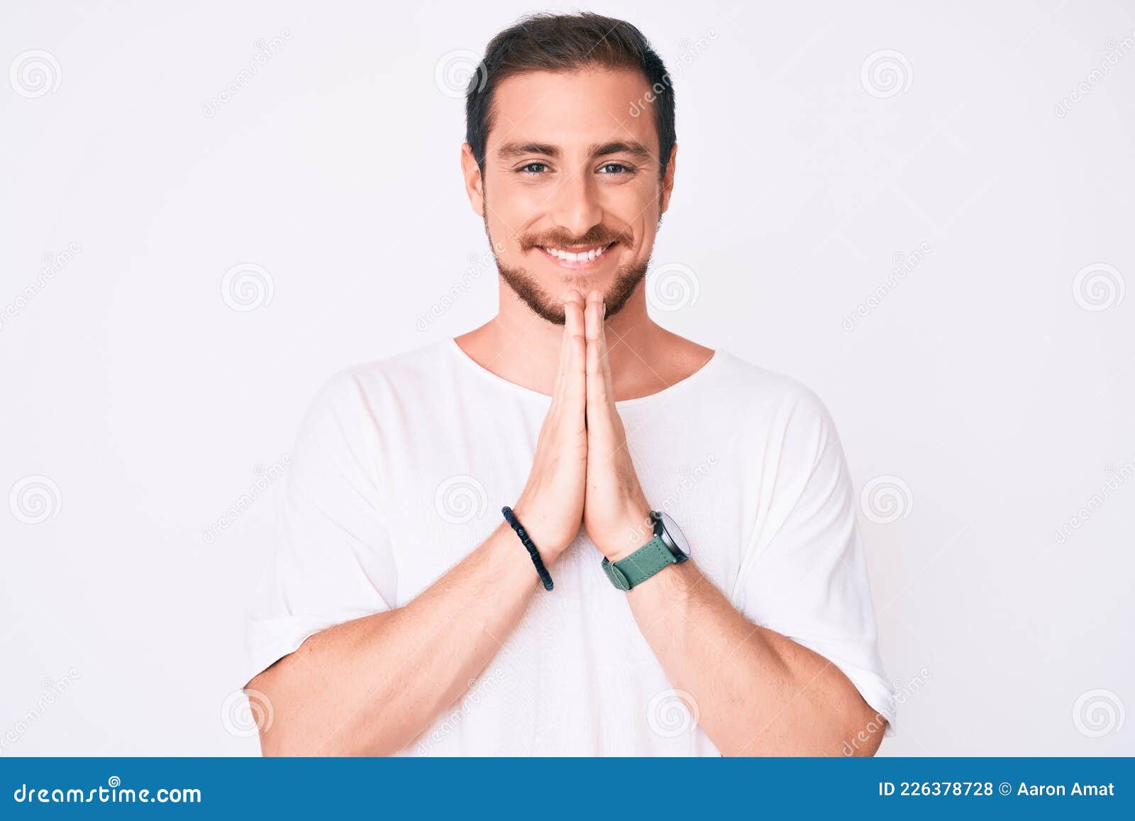 Young Handsome Man Wearing Casual White Tshirt Praying with Hands ...