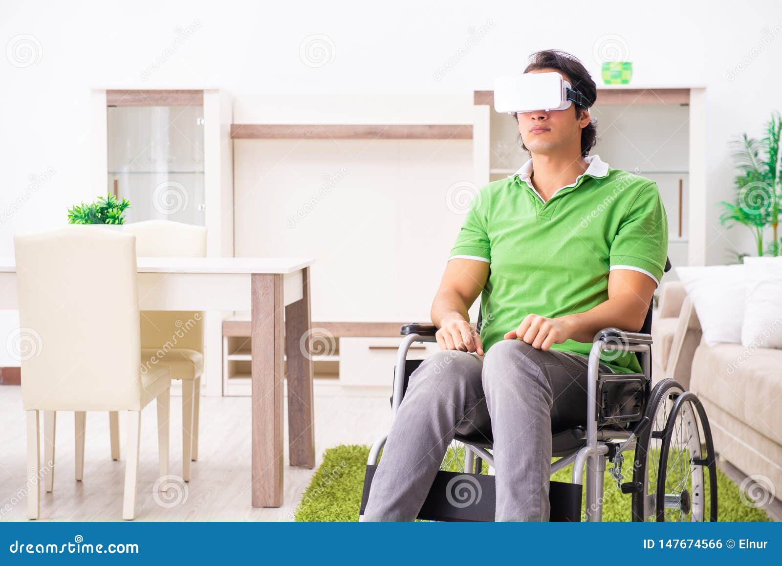 The Young Handsome Man in Wheelchair at Home Stock Photo Image of