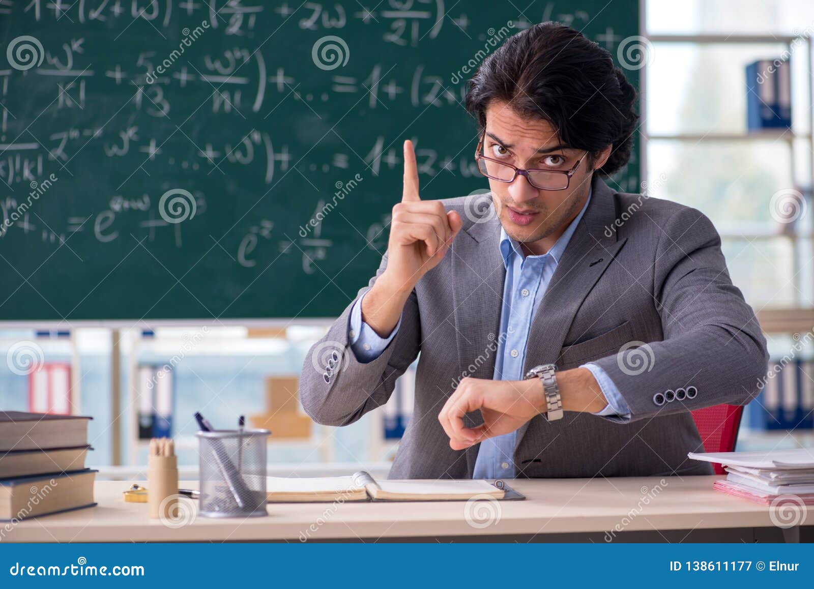 The Young Handsome Math Teacher In Classroom Stock Image Image
