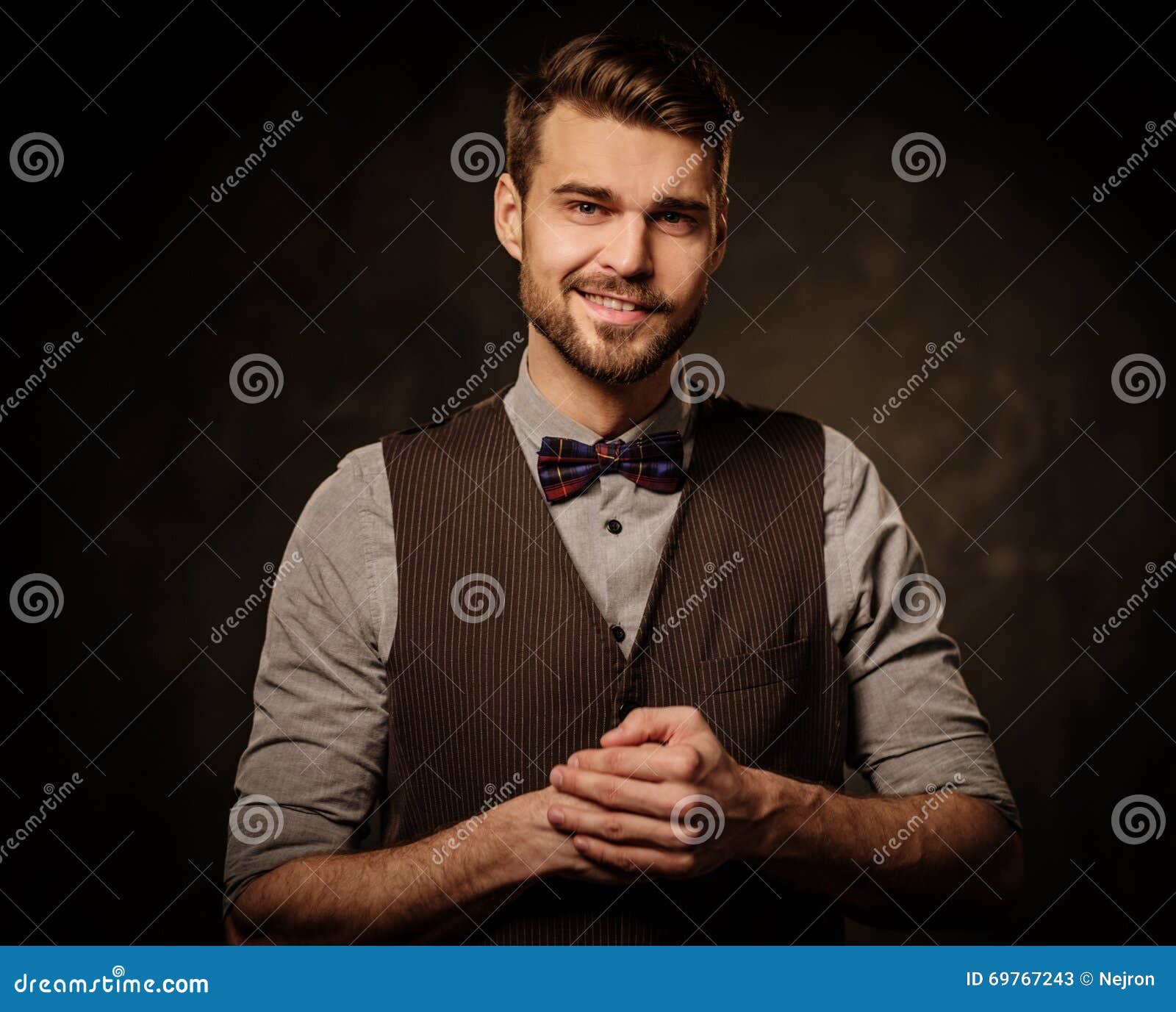 Young Handsome Oldfashioned Man with Beard Posing on Dark Background. Stock Image Image of