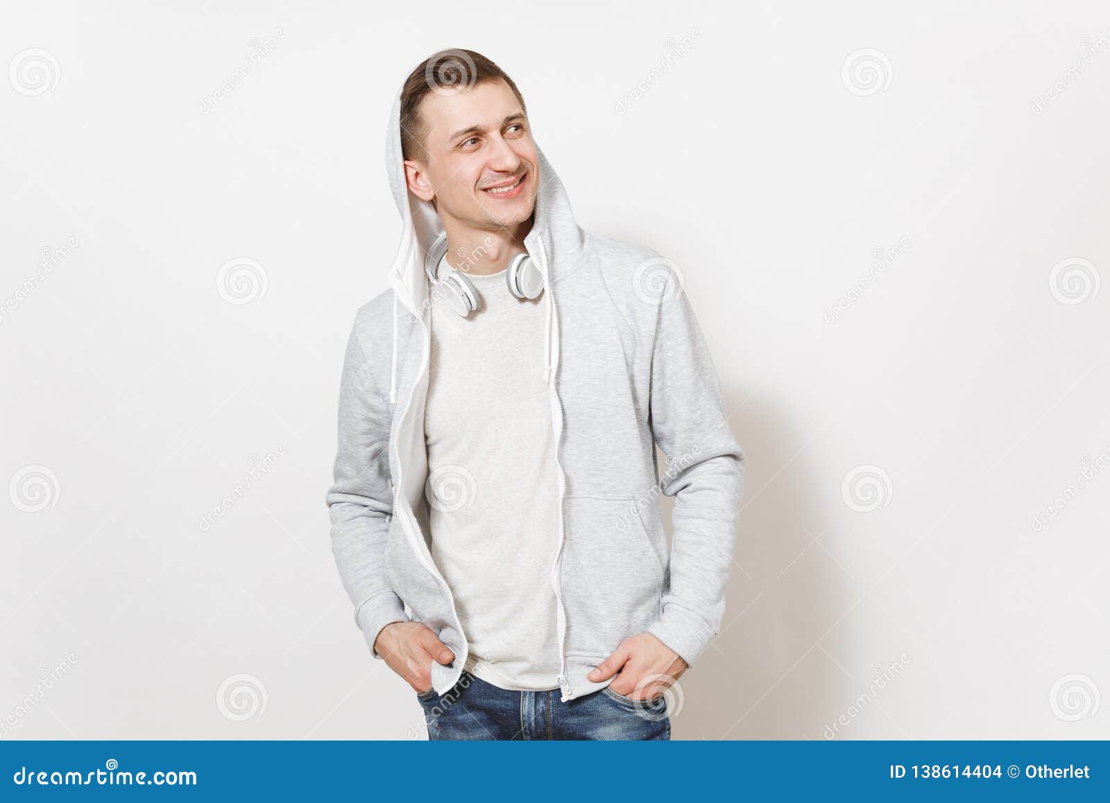 Young Handsome Smiling Guy in T-shirt, Blue Jeans and Light Sweatshirt ...