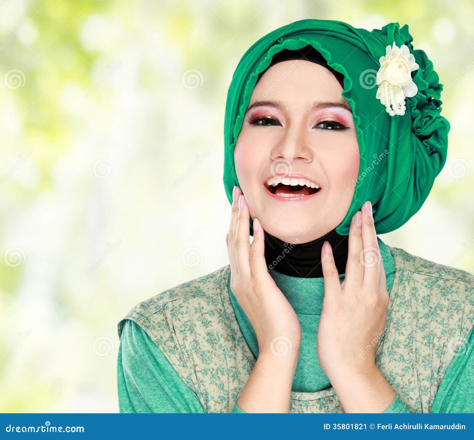 Young Happy Beautiful Muslim Woman With Green Costume 