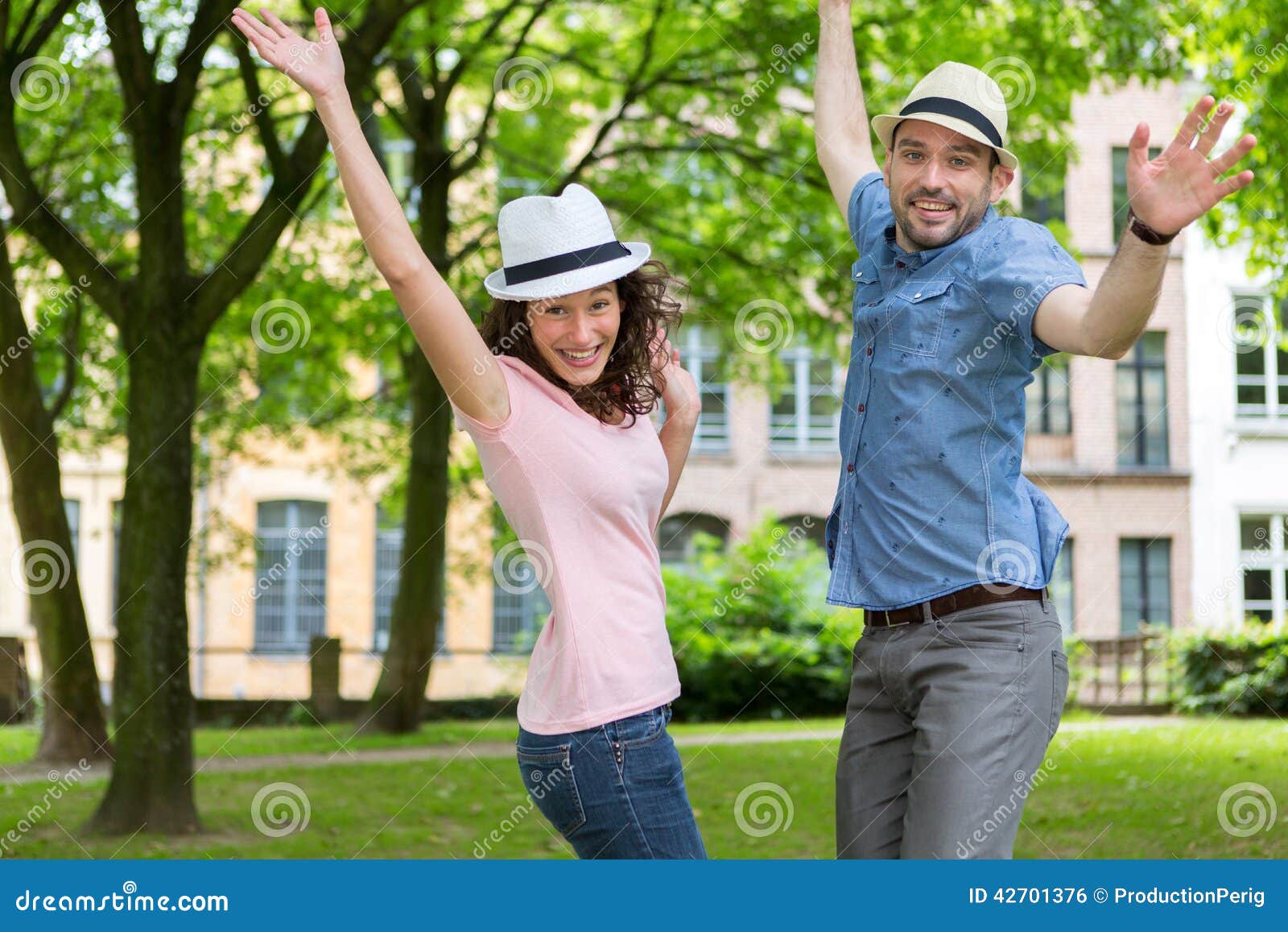 View of a Young happy couple having fun at the park