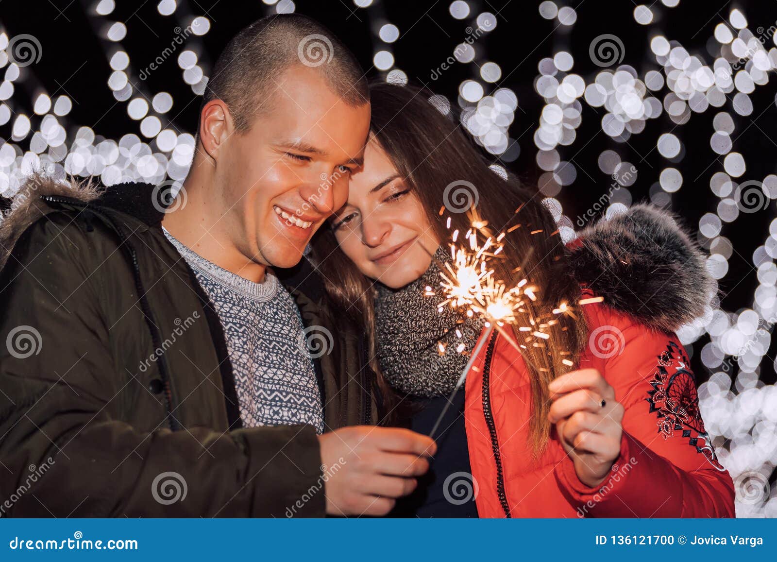 Young Happy Couple Having Fun With Sparklers Stock Photo Image Of