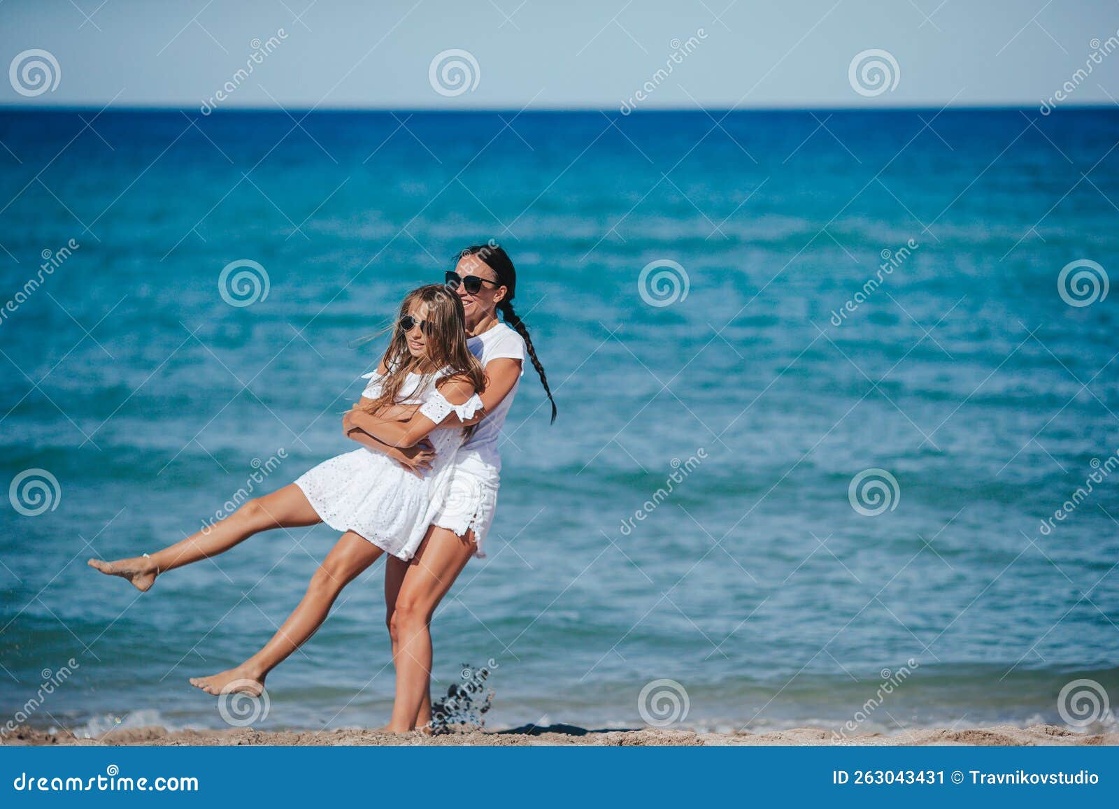 Young Happy Mother And And Her Daughter Having Fun On The Beach Stock Image Image Of Daughter 