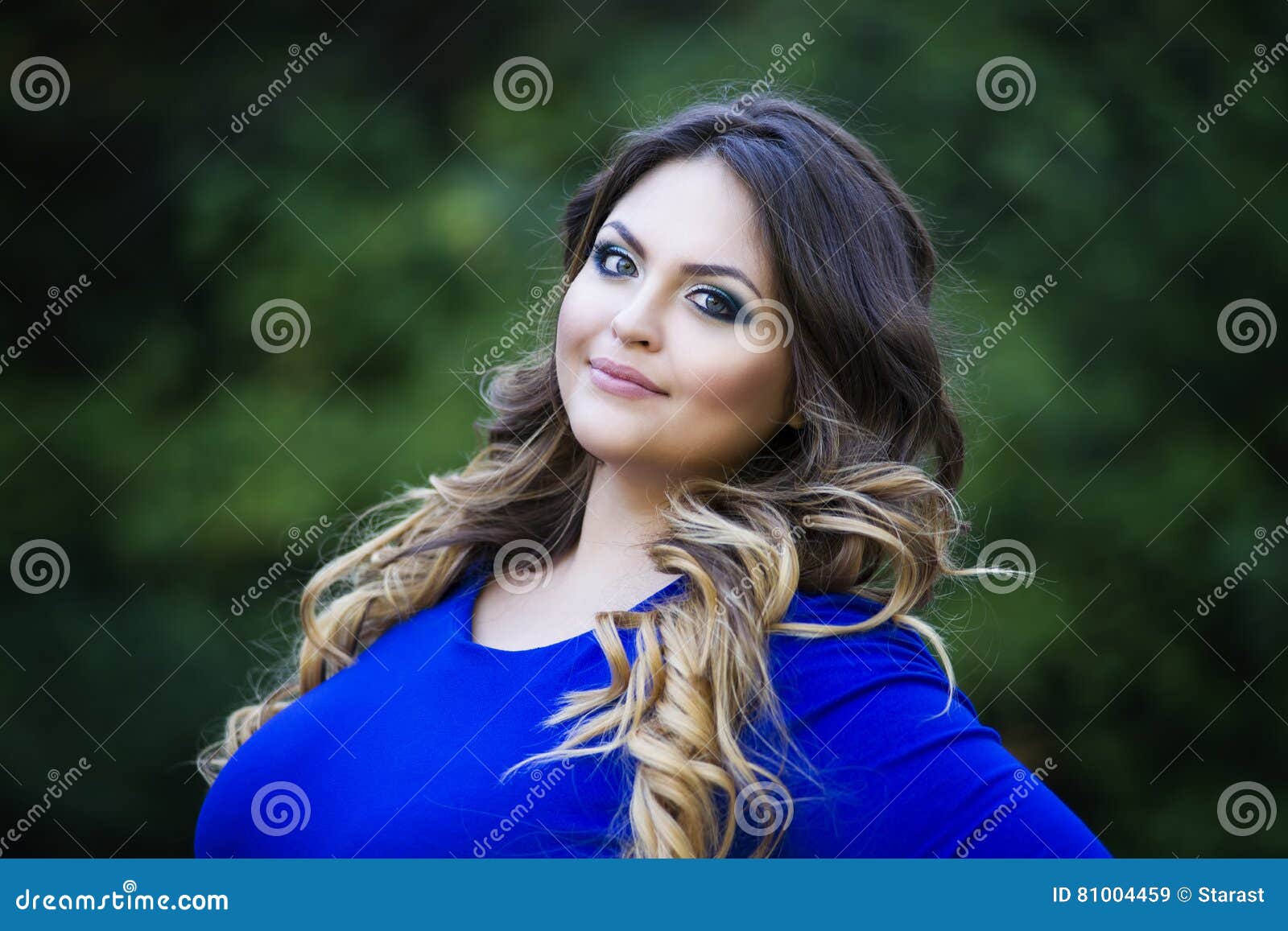 Beautiful Plus-size Model With Big Breast Smiling At Camera Stock Photo,  Picture and Royalty Free Image. Image 101966732.