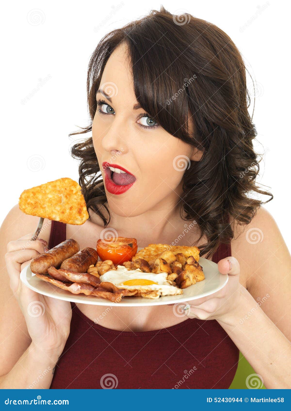 Young Happy Surprised Woman Eating a <b>Full English</b> Breakfast - young-happy-surprised-woman-eating-full-english-breakfast-dslr-royalty-free-image-consisting-fried-egg-sausages-bacon-52430944