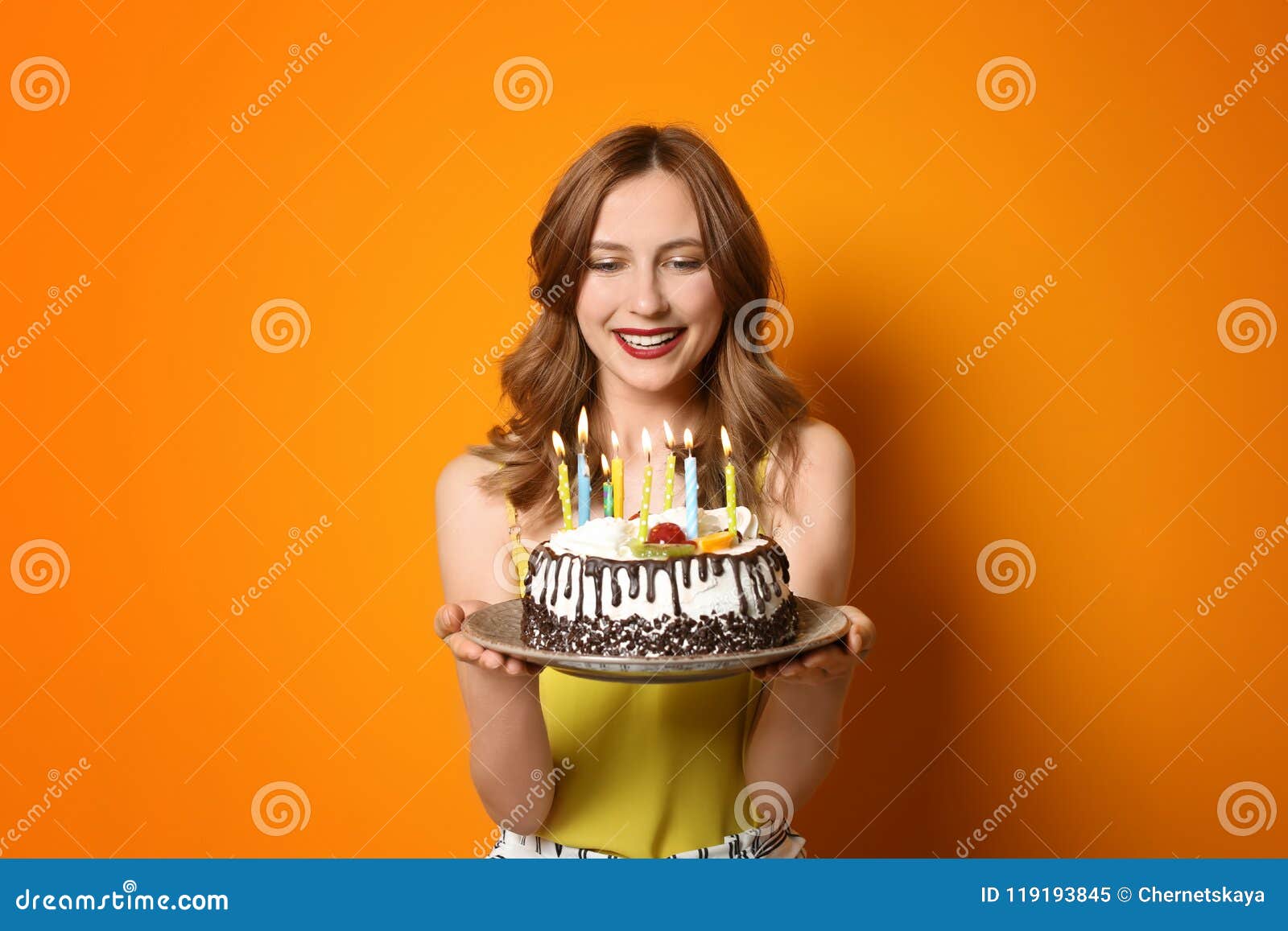 Young Woman with Birthday Cake on Color Background Stock Image ...