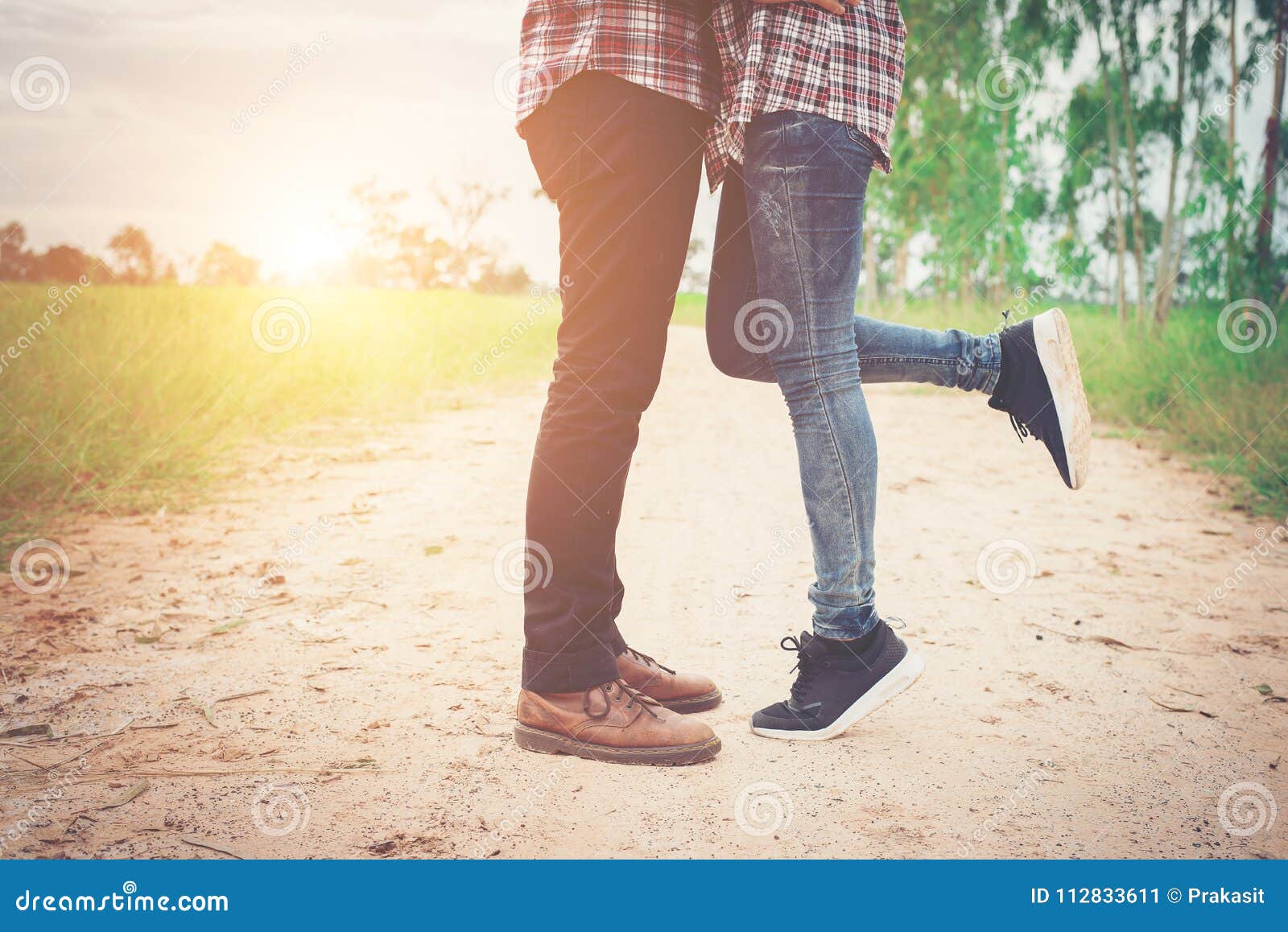 Young Hipster Couple Kissing in Summer Sun Light. Kiss Love Stan Stock ...