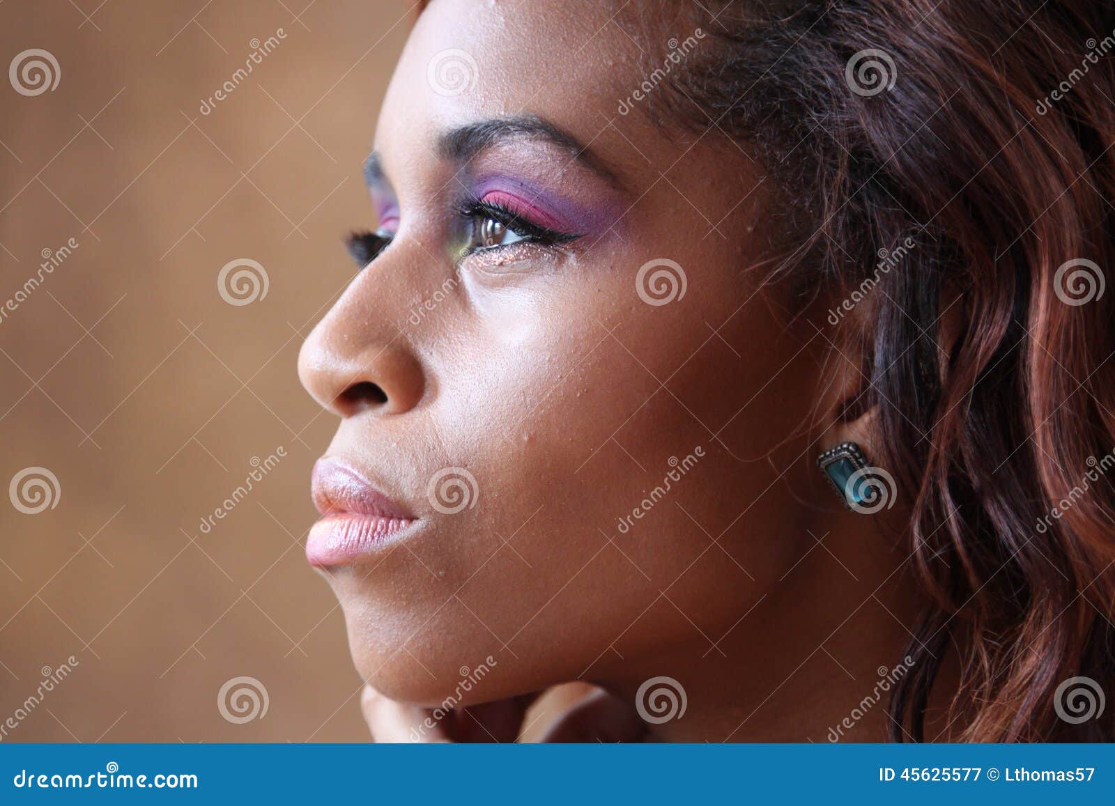 young hispanic black woman profile headshot