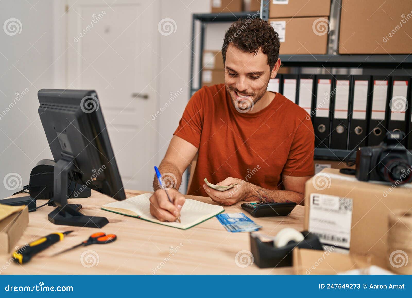 Young Hispanic Man Ecommerce Business Worker Writing on Notebook Holding  Chile Pesos Banknotes at Office Stock Image - Image of banknotes, handsome:  247649273