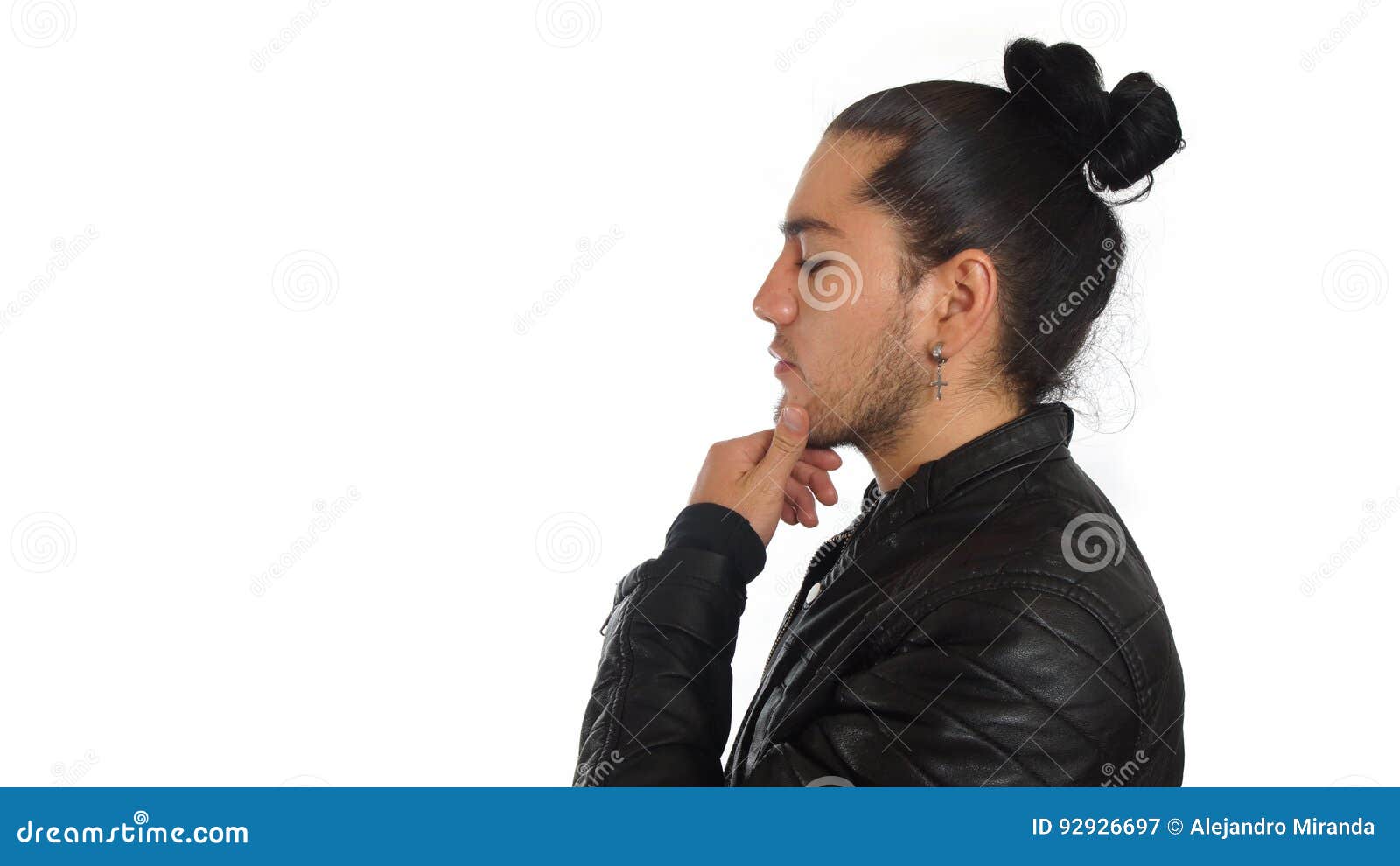 Young Hispanic Man with Gathered Hair Done Bow Wearing Black T-shirt ...