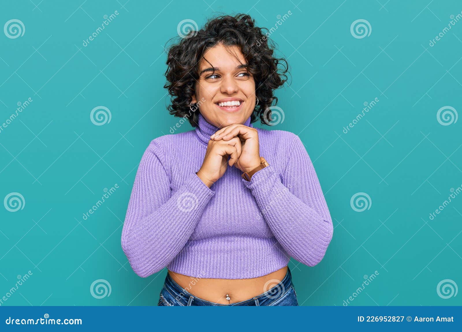 Young Hispanic Woman With Curly Hair Wearing Casual Clothes Laughing Nervous And Excited With 
