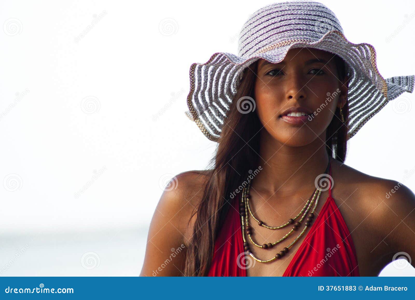 Young Hispanic Woman in Sun Hat at Beach Stock Image - Image of rican,  caribbean: 37651883