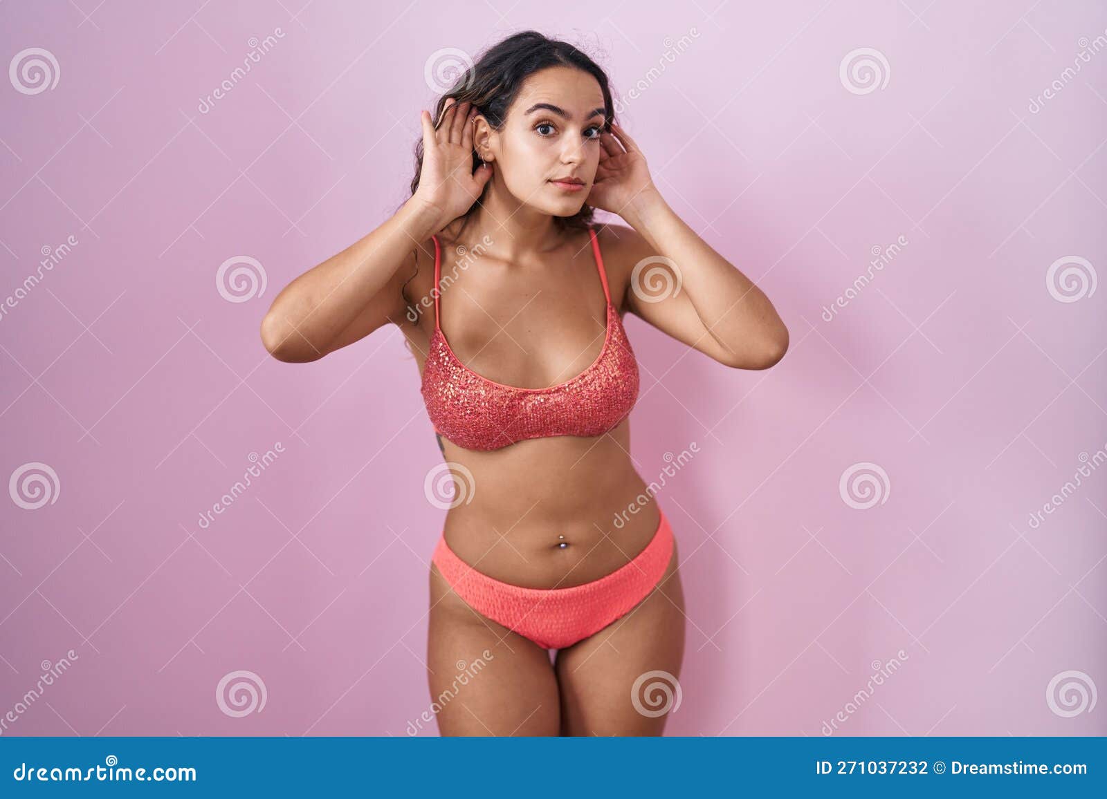 Young Hispanic Woman Wearing Lingerie Over Pink Background Trying To Hear  Both Hands on Ear Gesture, Curious for Gossip Stock Photo - Image of adult,  gossip: 271037232