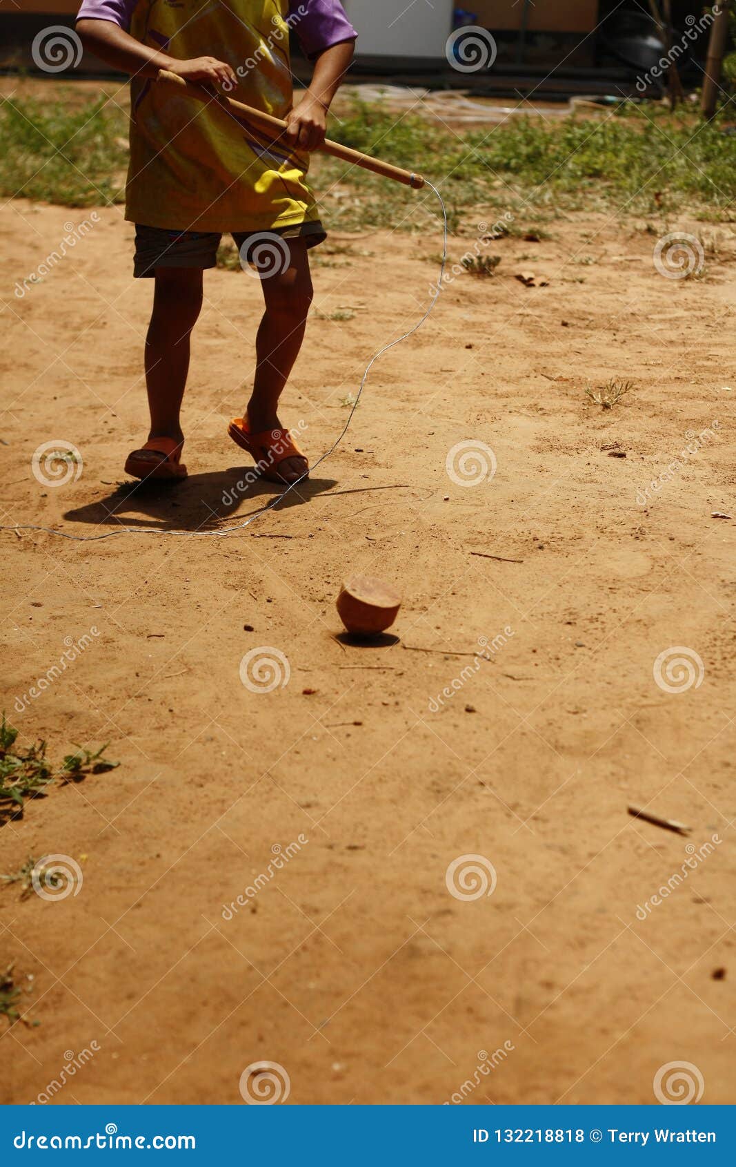 Young Hmong Boy Playing with His Homemade Timber Spinning Top Editorial ... picture pic