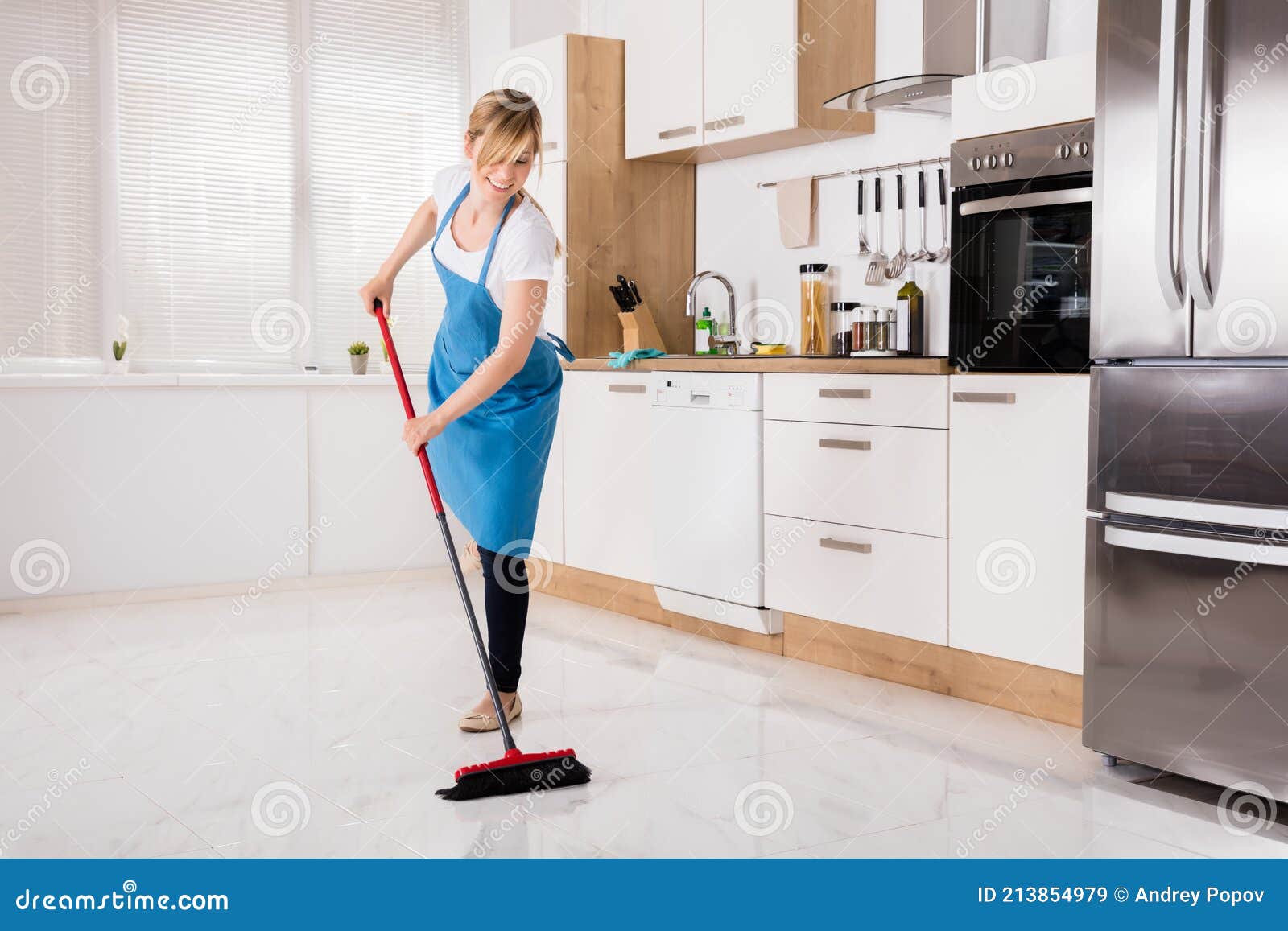 Housemaid Sweeping Floor in Kitchen Stock Image Image of beautiful