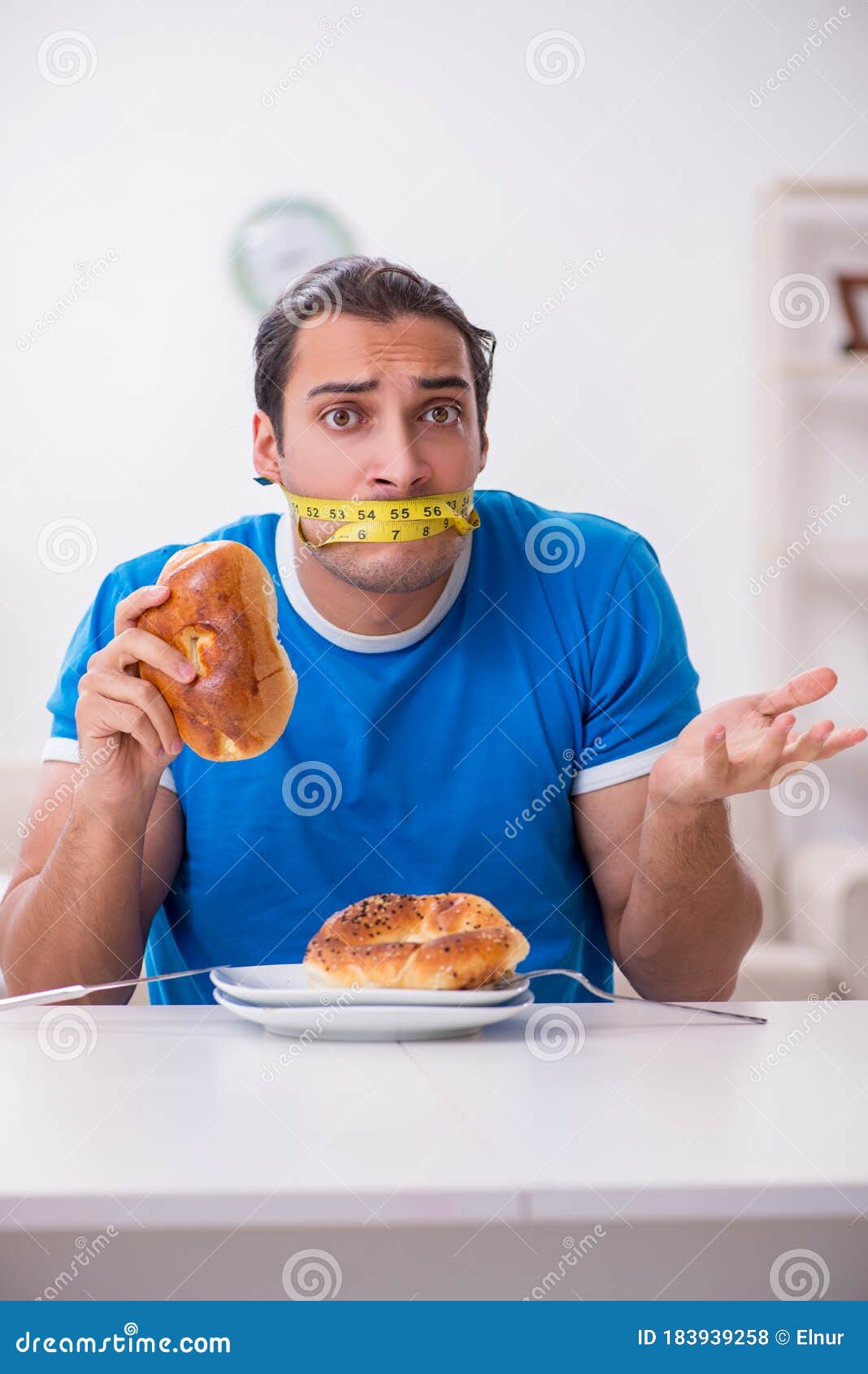 Young Hungry Man in Dieting Concept Stock Photo Image of disorder