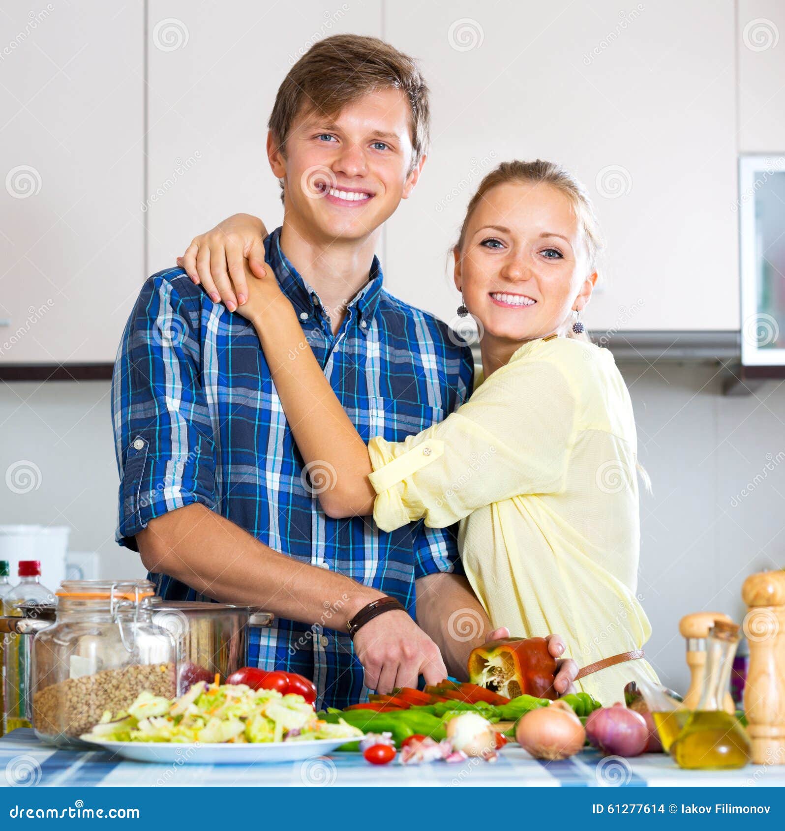 Young Husband Helping Wife Royalty-Free Stock Image ...